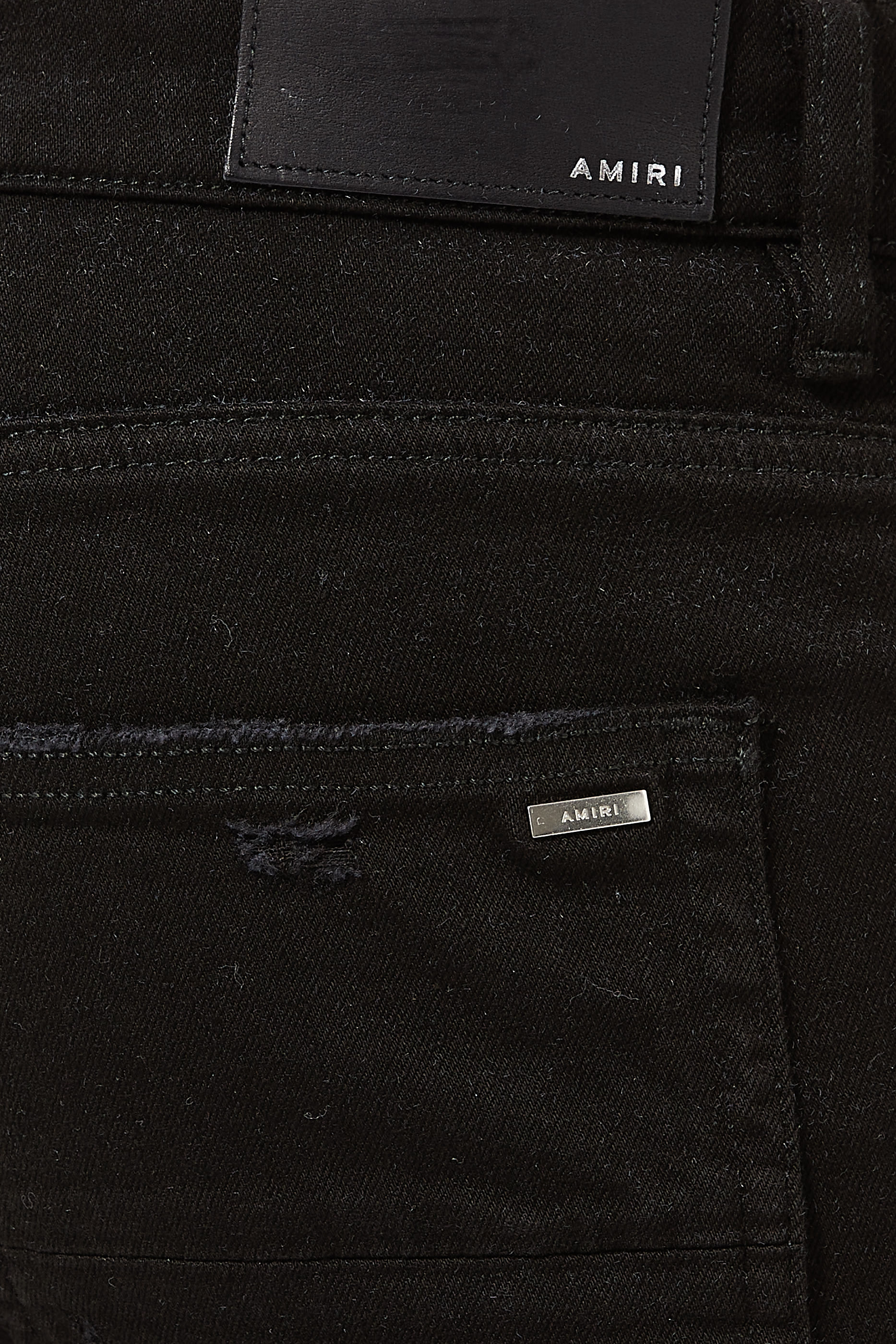 بنطال جينز إم إكس 1 بتصميم ممزق