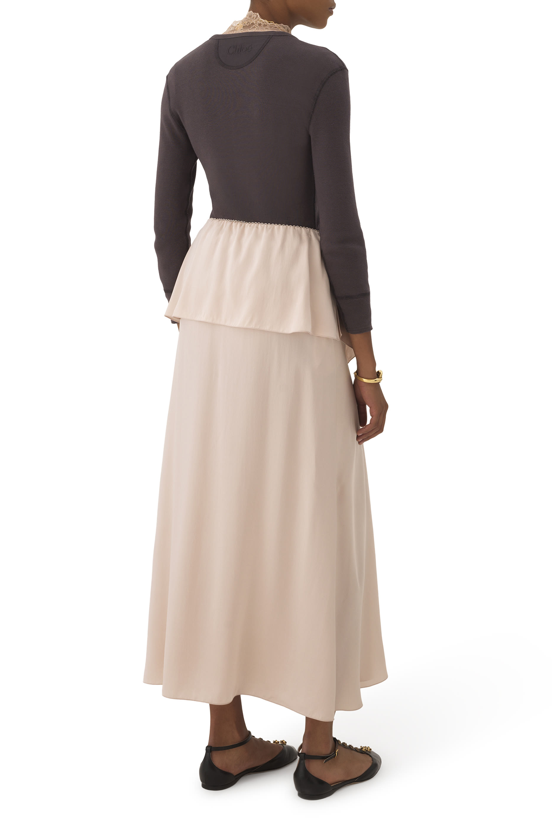 تنورة متوسطة الطول بطبقتين قماش انسيابي