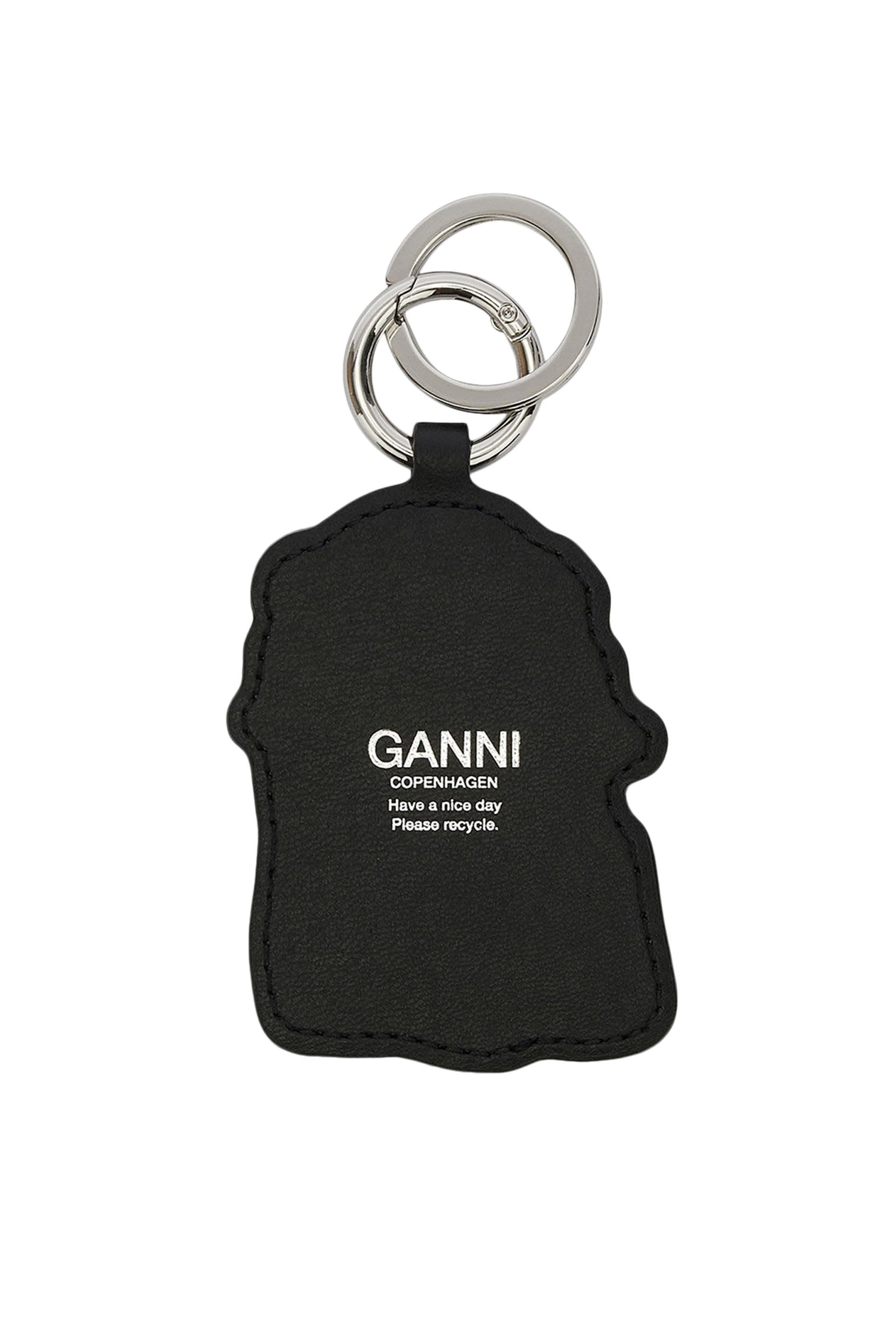 سلسلة مفاتيح بتصميم فيونكة كلب جوي