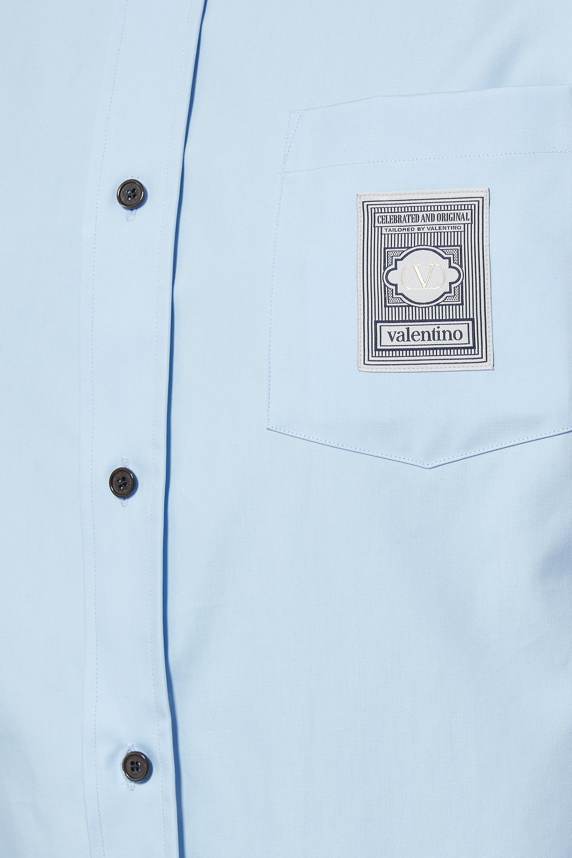 قميص قطن بشعار الماركة