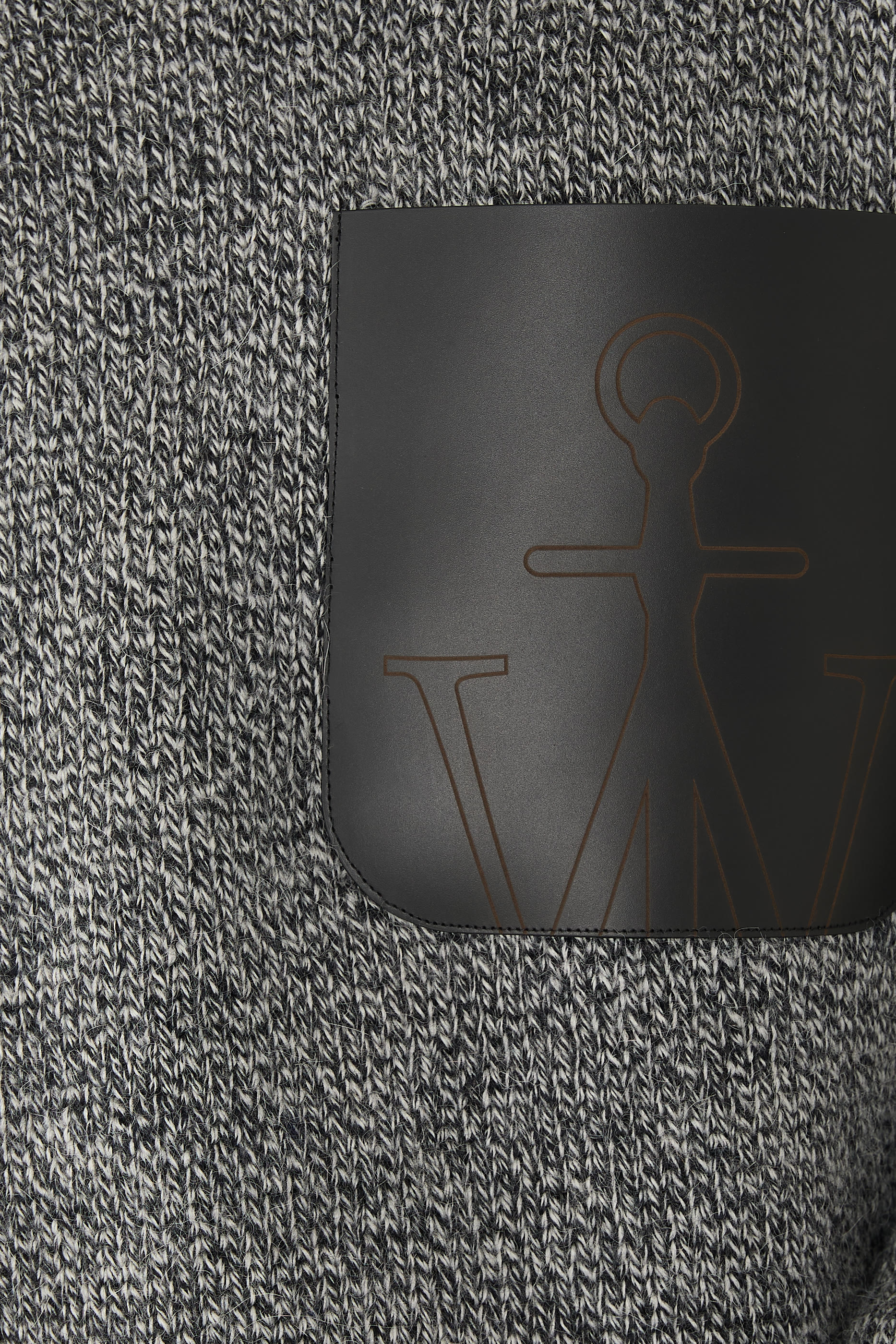 كنزة بجيب خارجي جلد