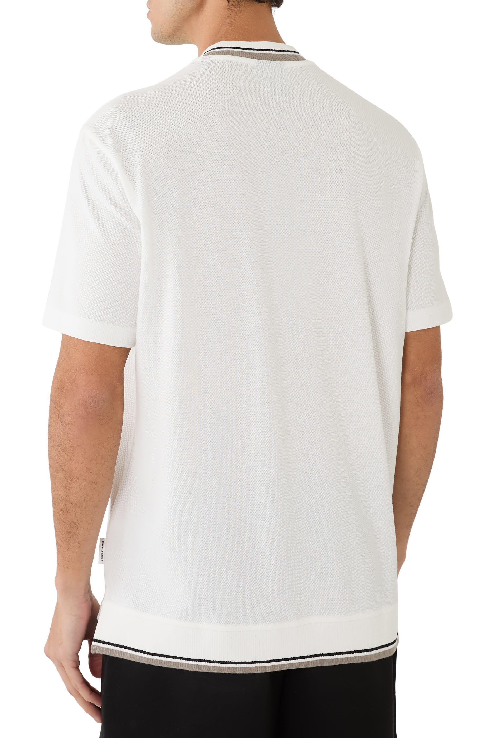 قميص بولو بسحاب قصير مزين بشعار الماركة