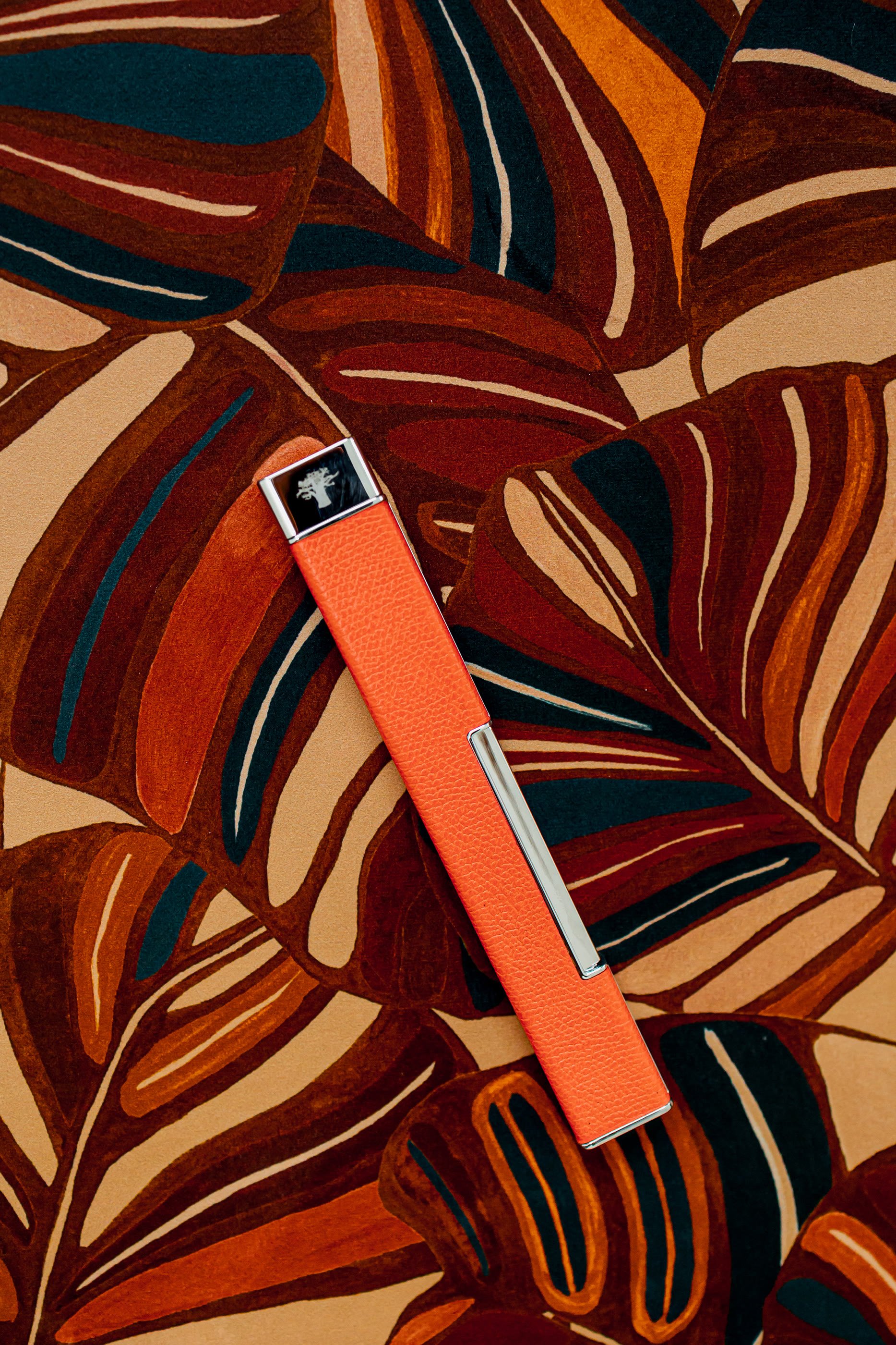 ولاعة غرين باللون البرتقالي