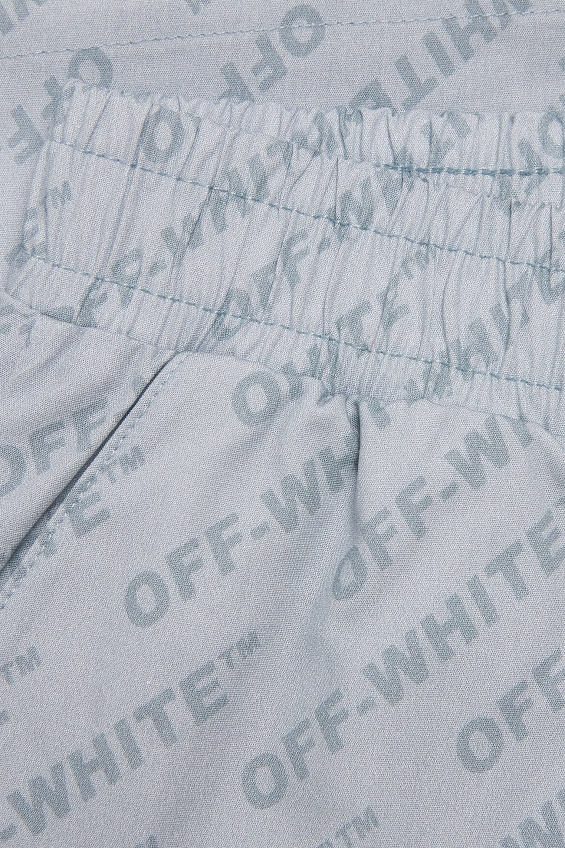 شورت بنقشات شعار الماركة للأطفال