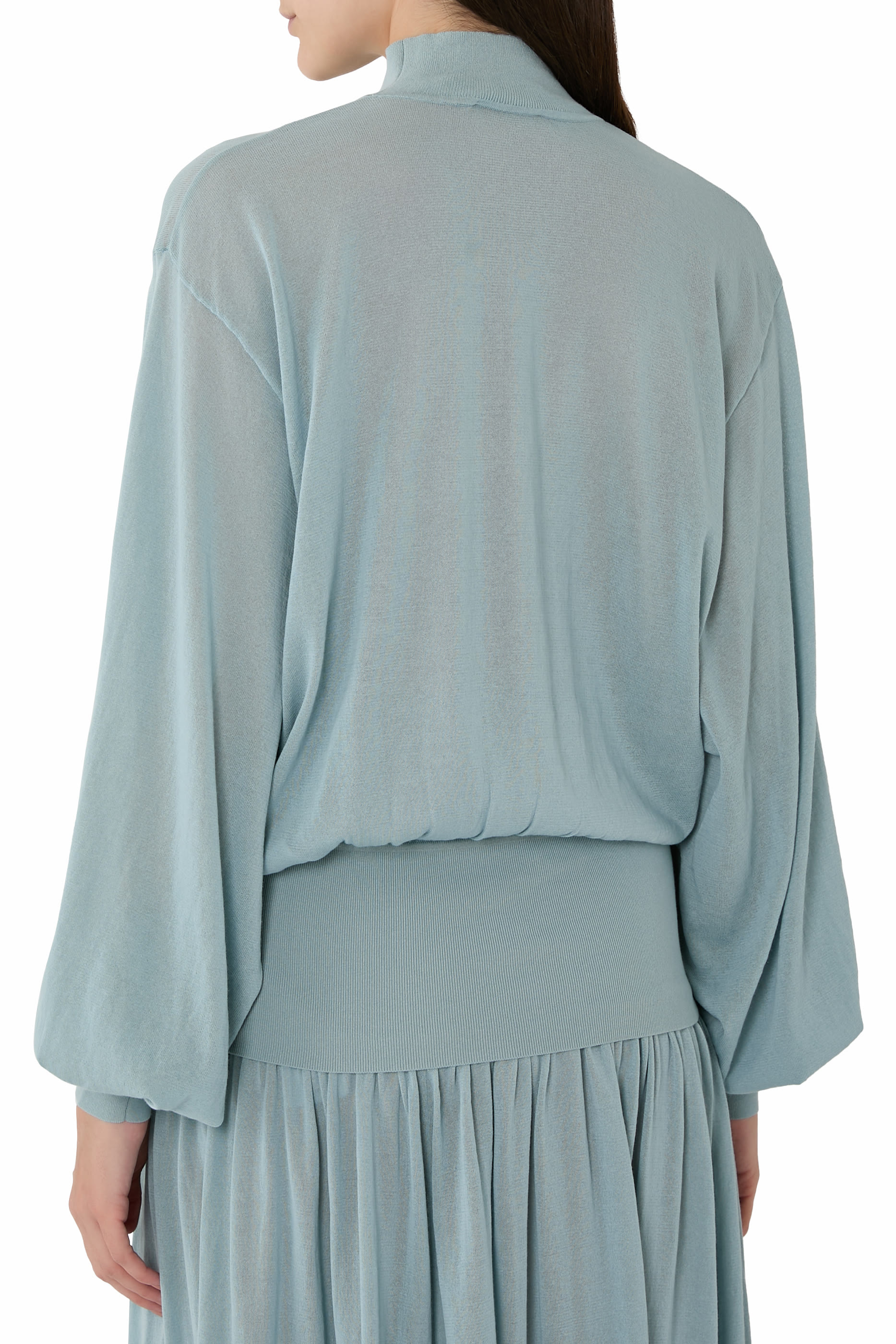 بلوزة هيبنوتيك بكشكش وأكمام منفوخة