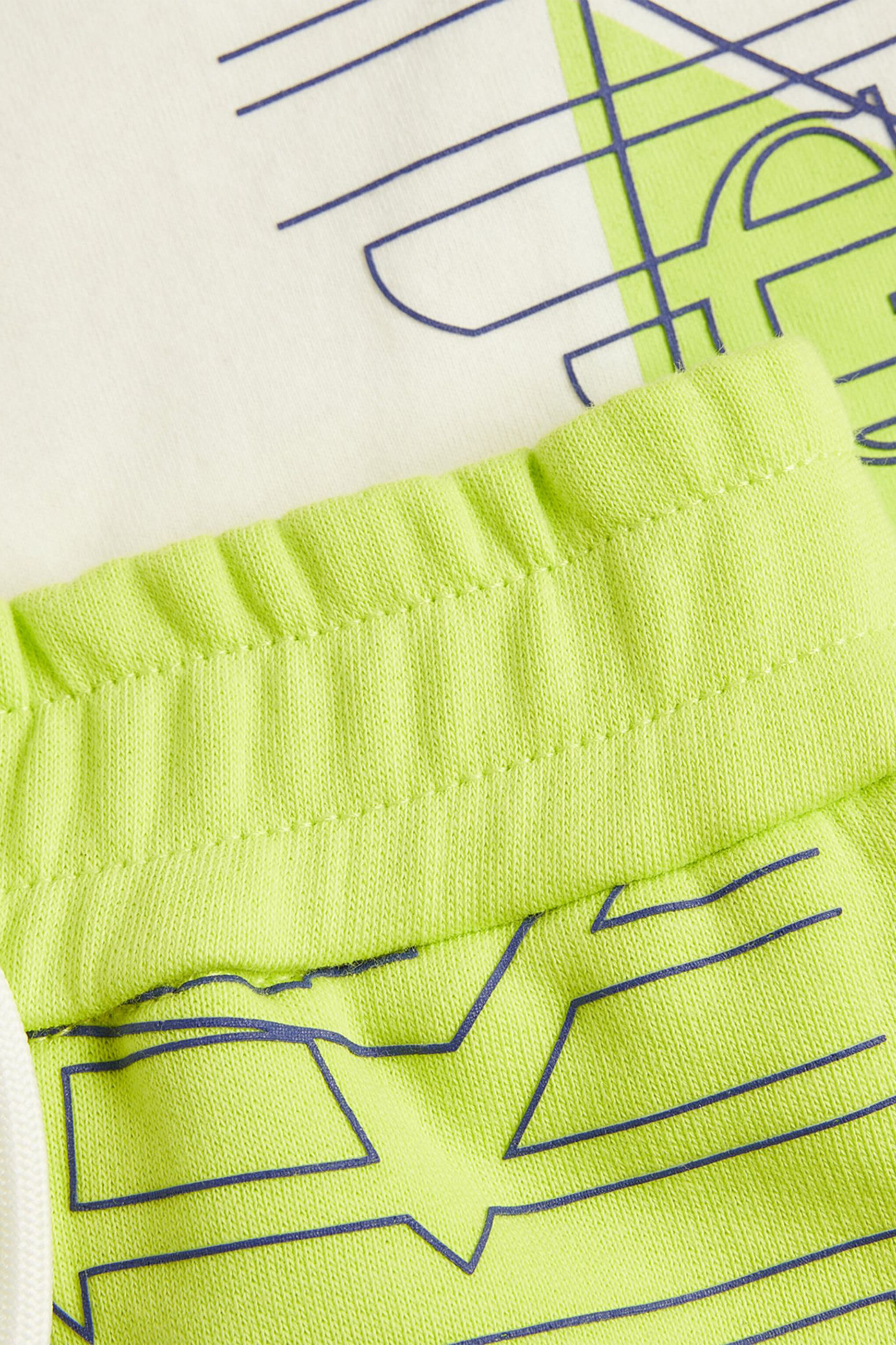 طقم بلوزة وشورت للأطفال بشعار الماركة