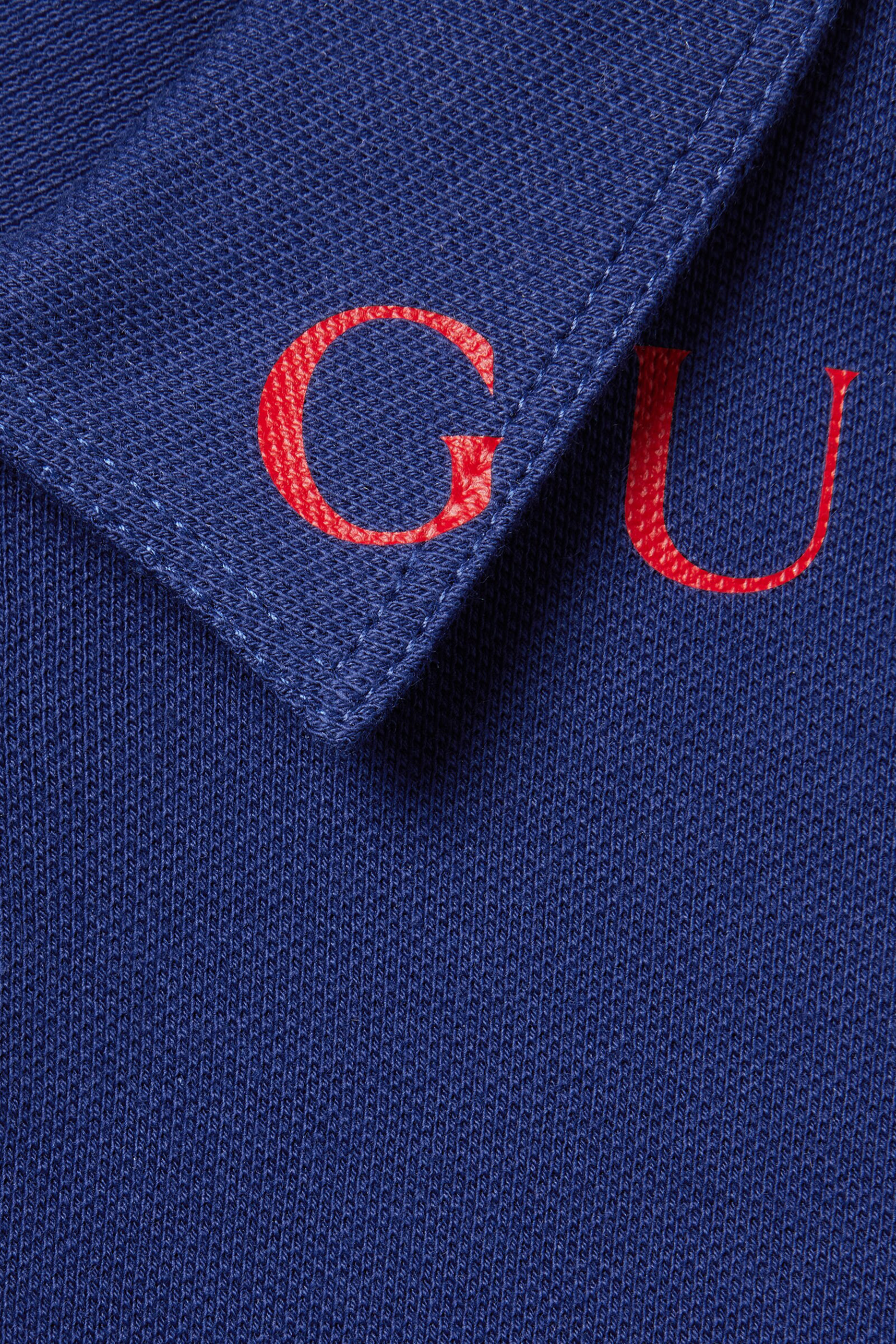 قميص بولو بشعار الماركة للأطفال