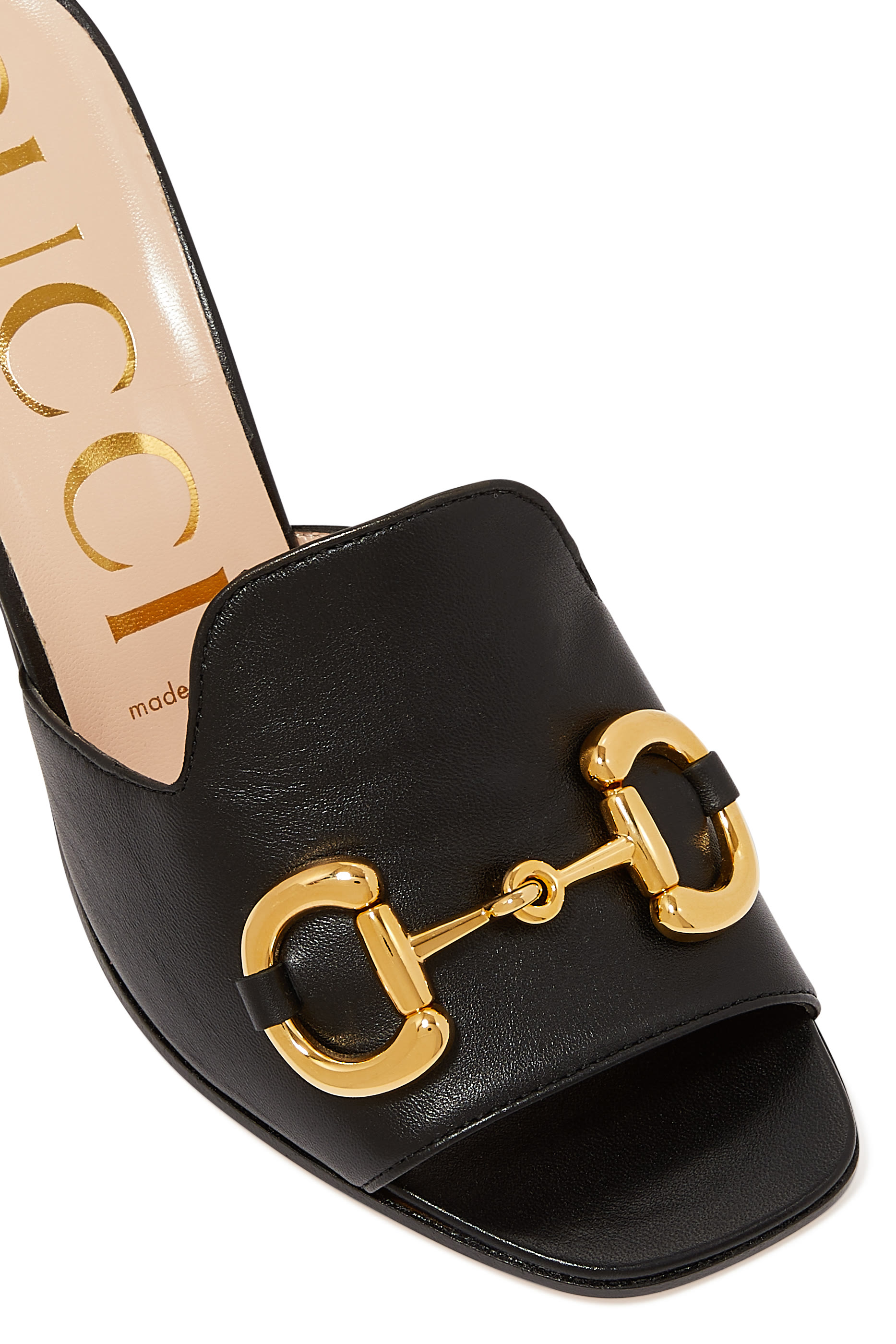 حذاء مفتوح من الخلف بحلية لجام الحصان جلد