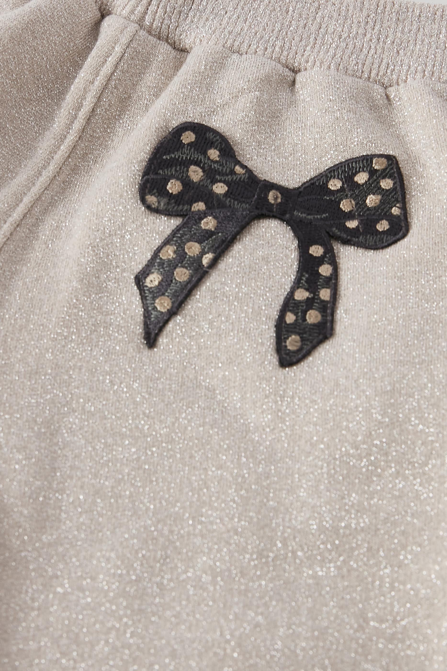 بنطال رياضي مزين بجليتر وربطة فيونكة للأطفال