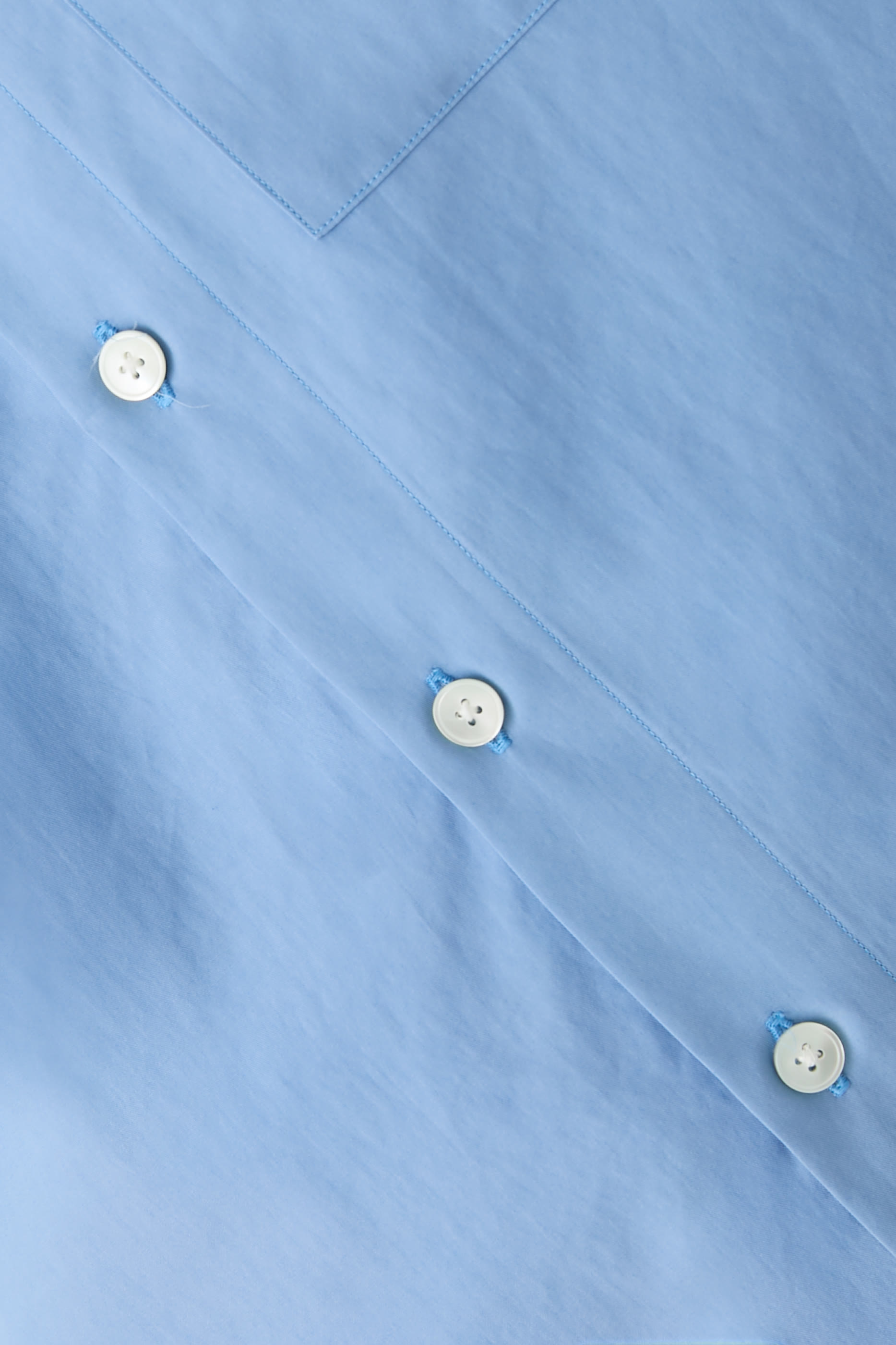 قميص بأكمام نصفية واسعة قماش فينكس تويل باهت