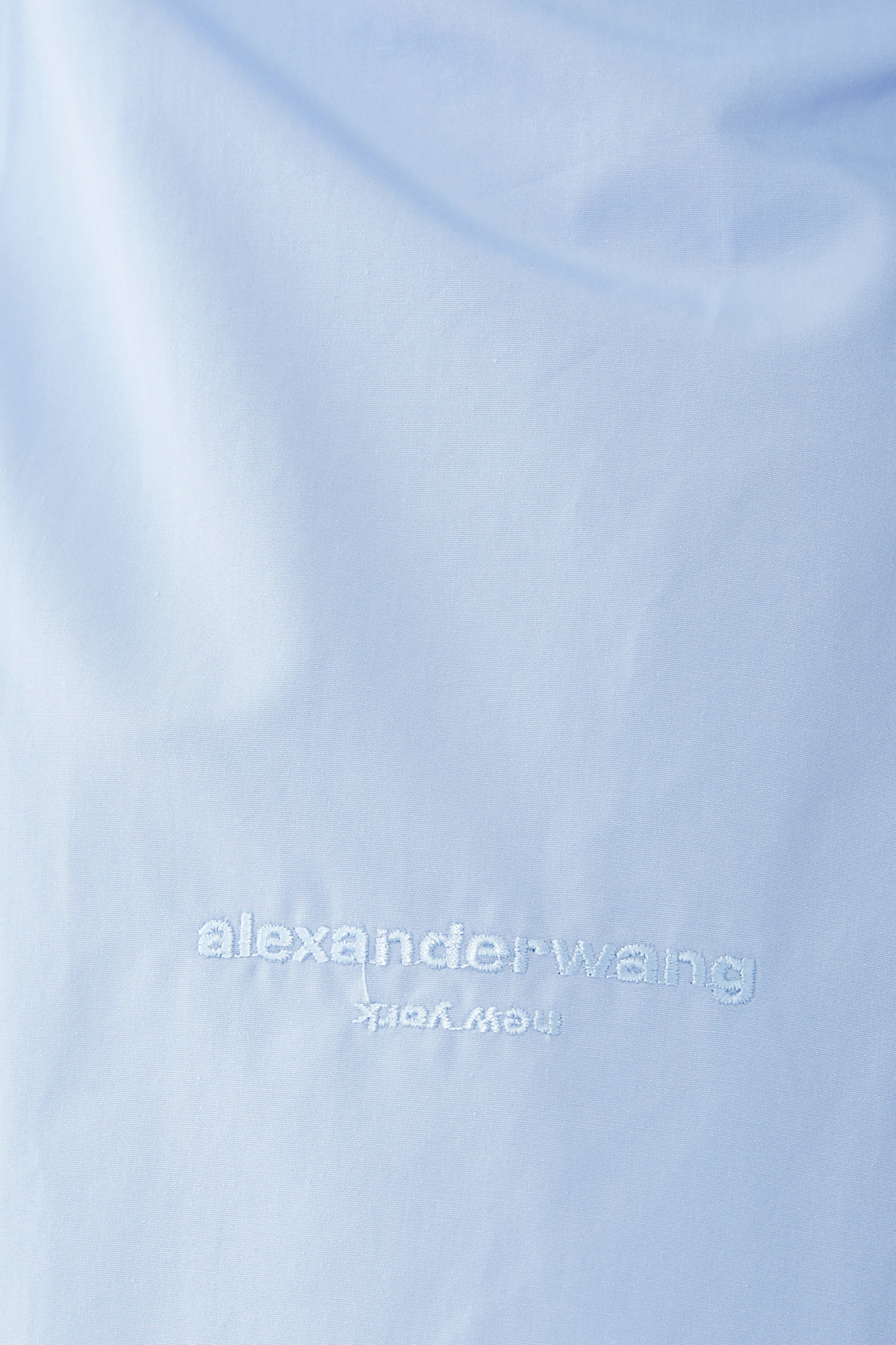 قميص بظهر مضلع وخصر مزموم