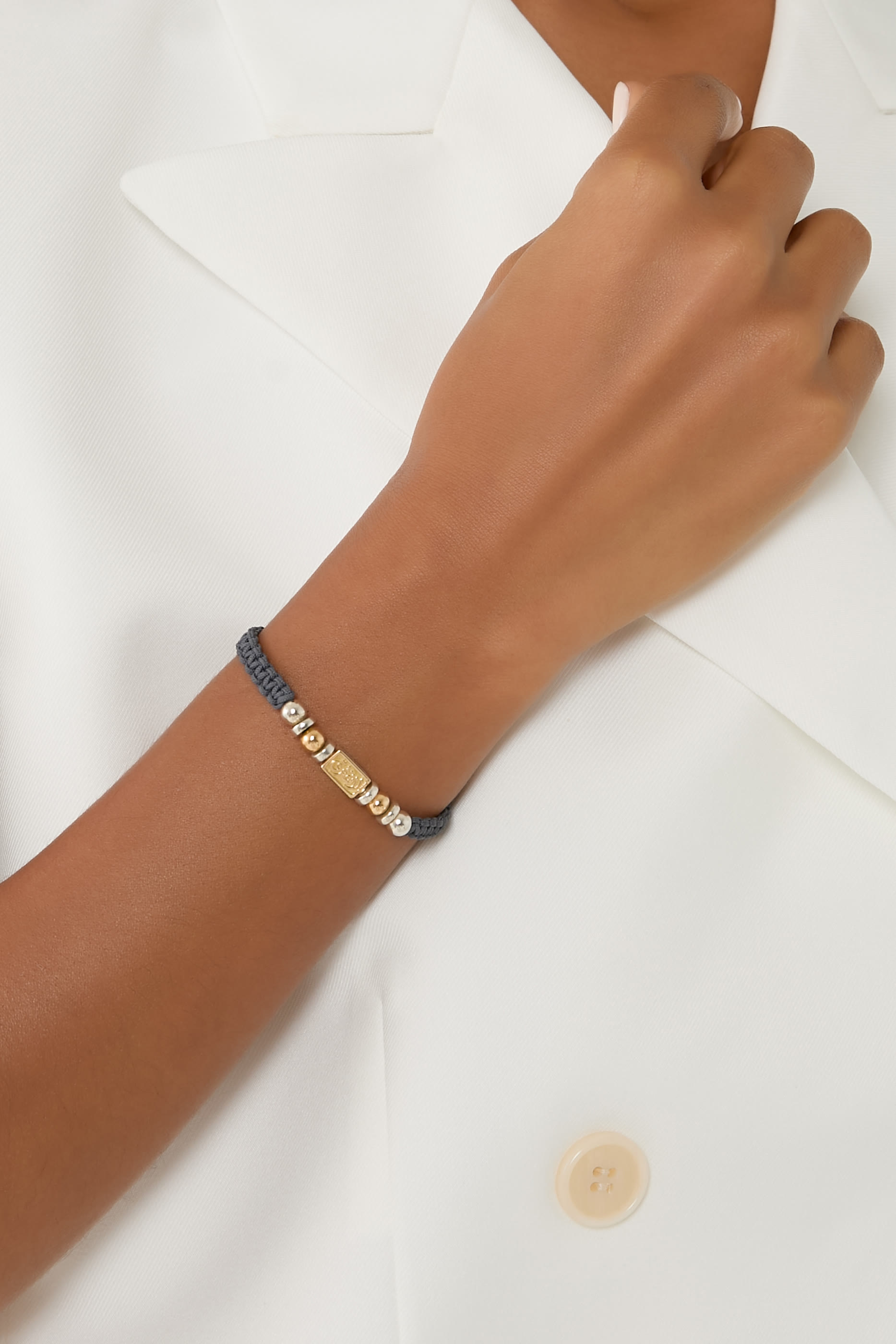 سوار النور مجدول بعبارة "لا نفترق"، فضة إسترلينية وذهب أصفر عيار 18