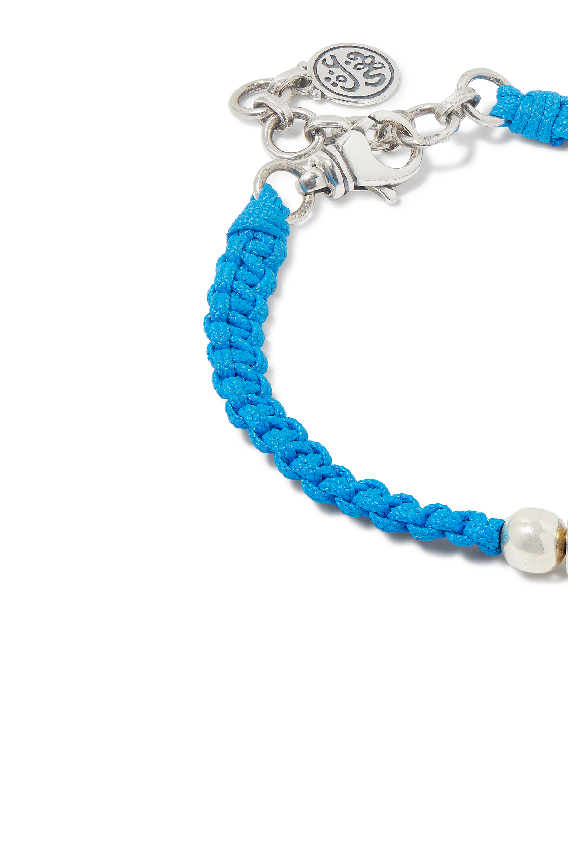 سوار نيفر أبارت بتصميم مضفر، ذهب أصفر عيار 18، فضة استرلينية وقماش. 