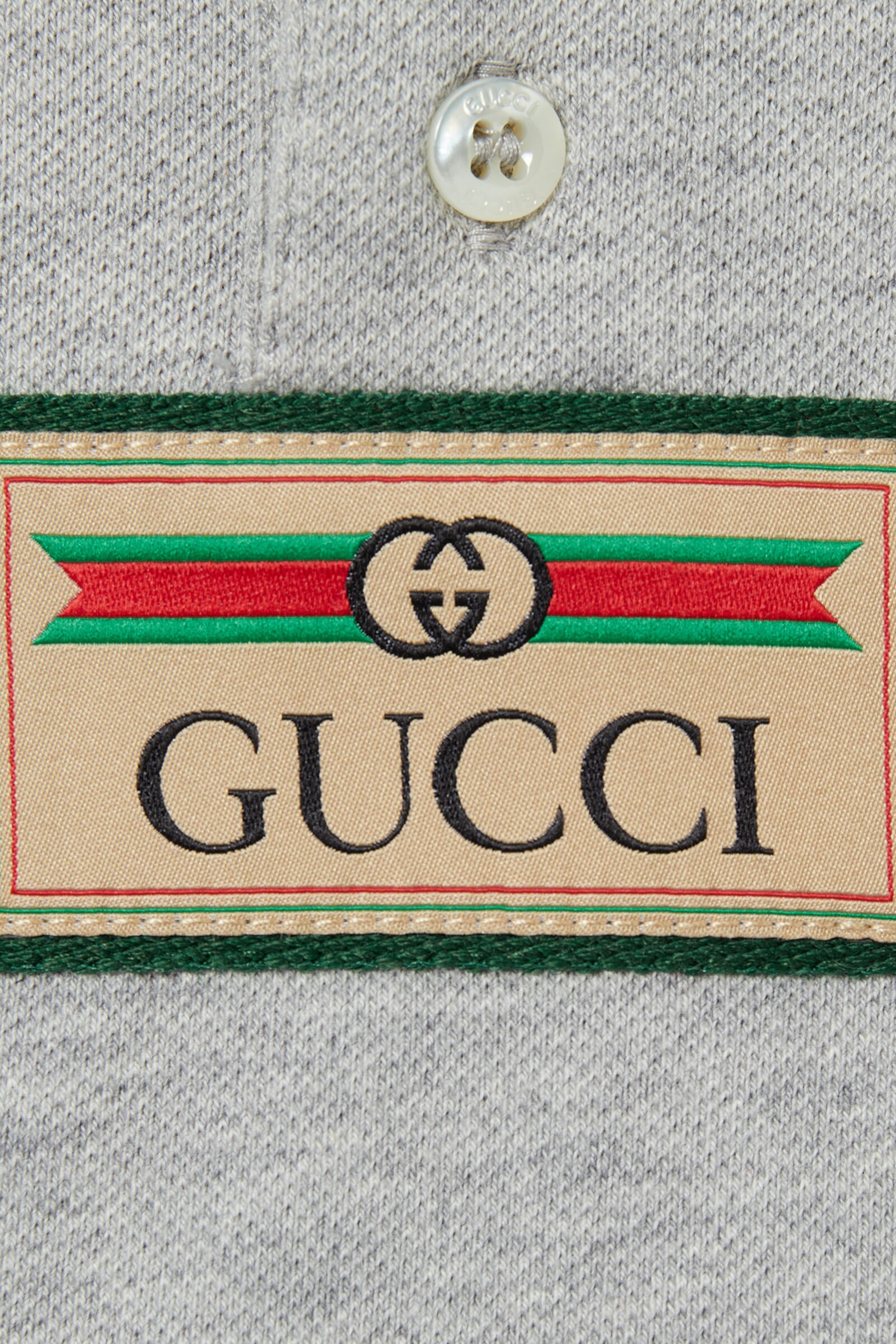 قميص بولو بشريط ويب للأطفال