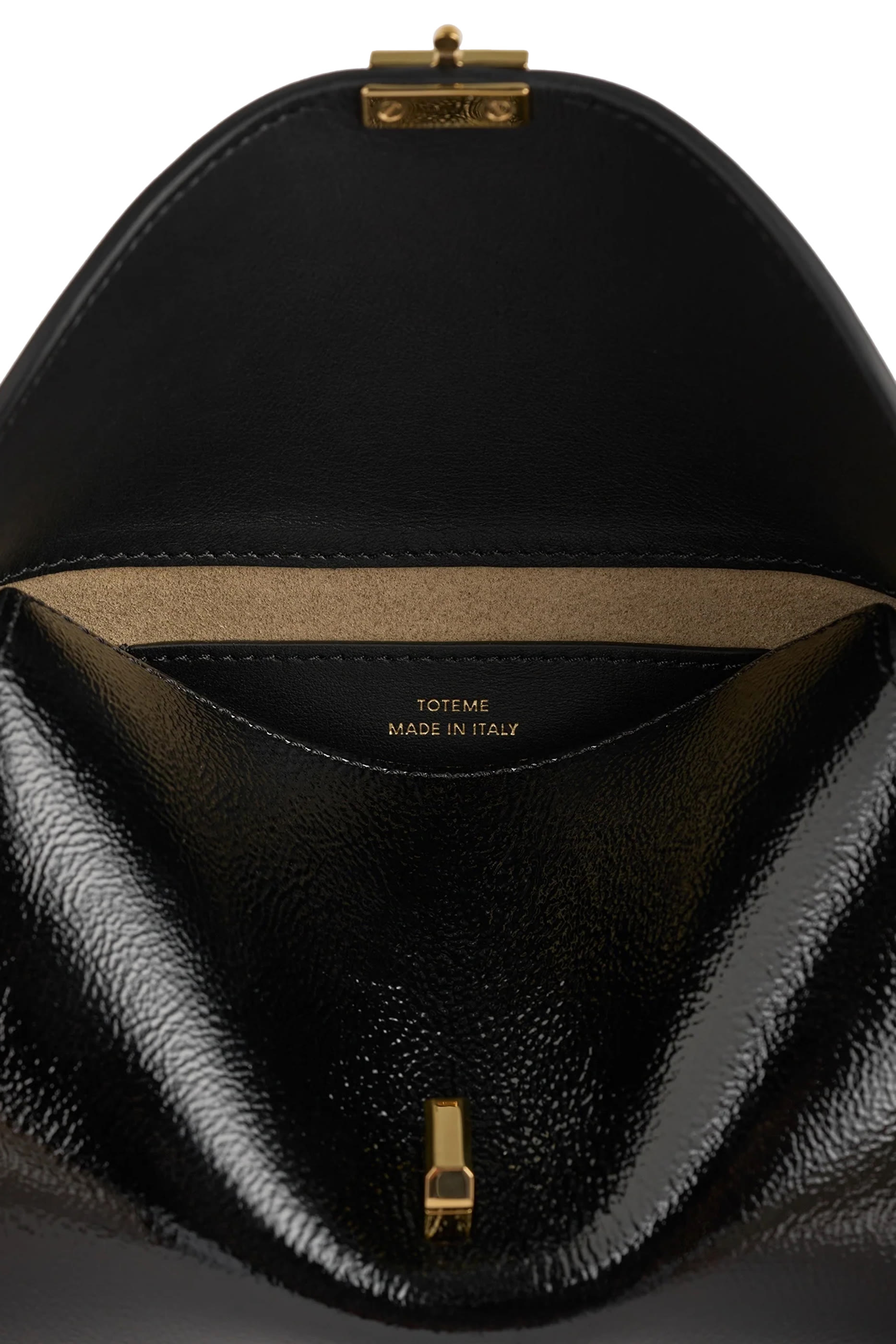 كلاتش نابلاك صغير بإغلاق على شكل حرف T 