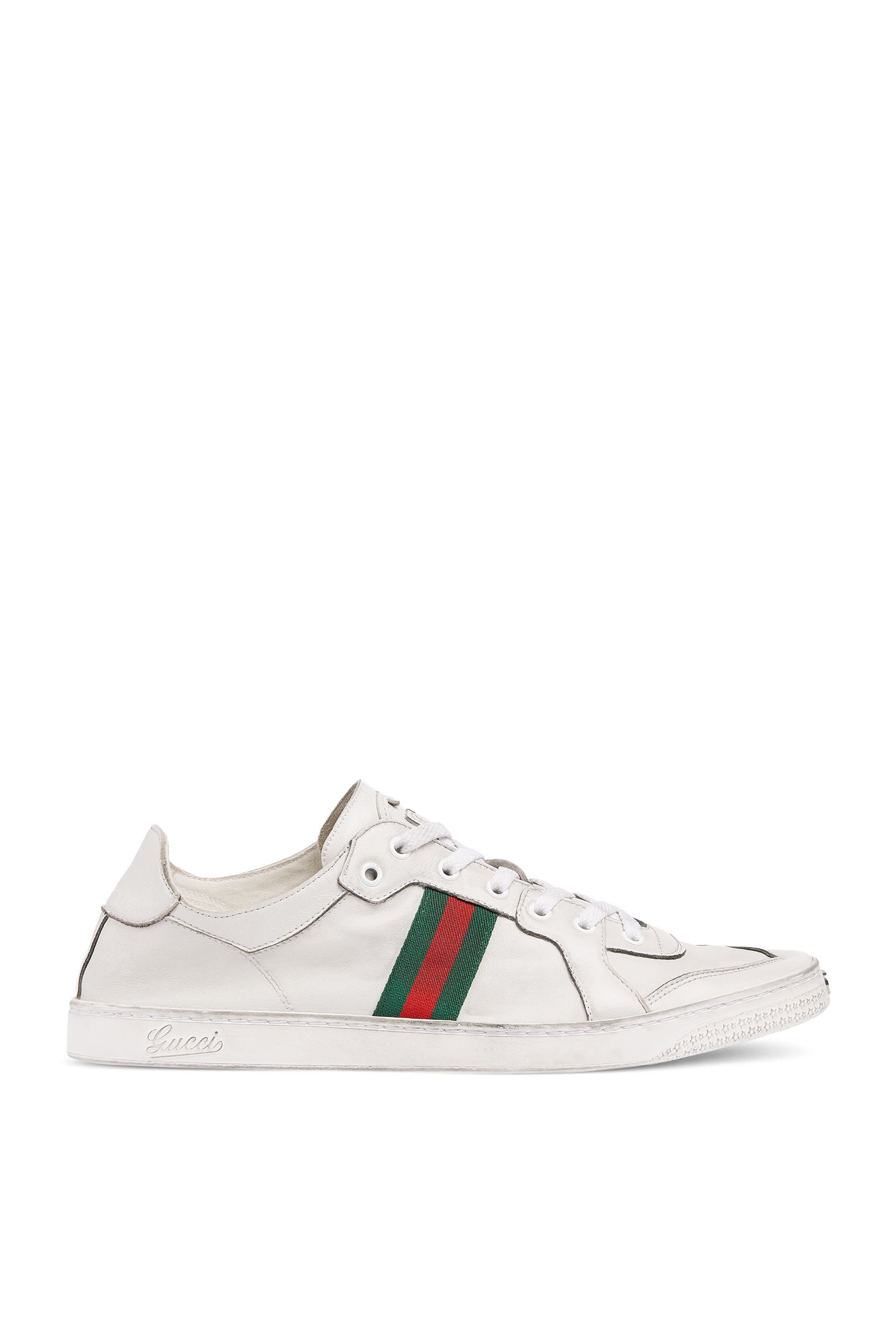 سنيكرز بكاحل منخفض وشريط ويب خامة مطاطية