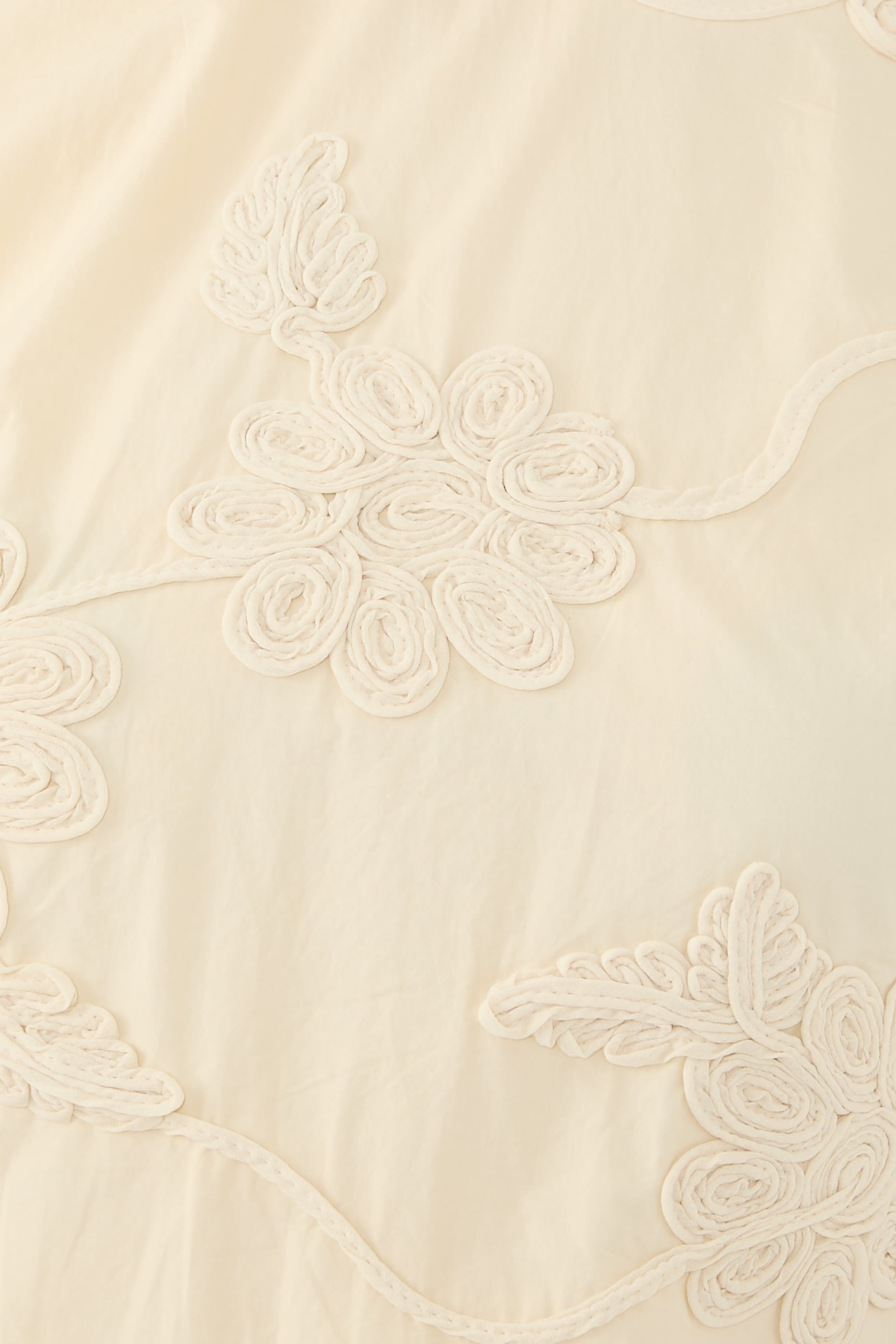 بلوزة بلا أكمام بزهور مطرزة