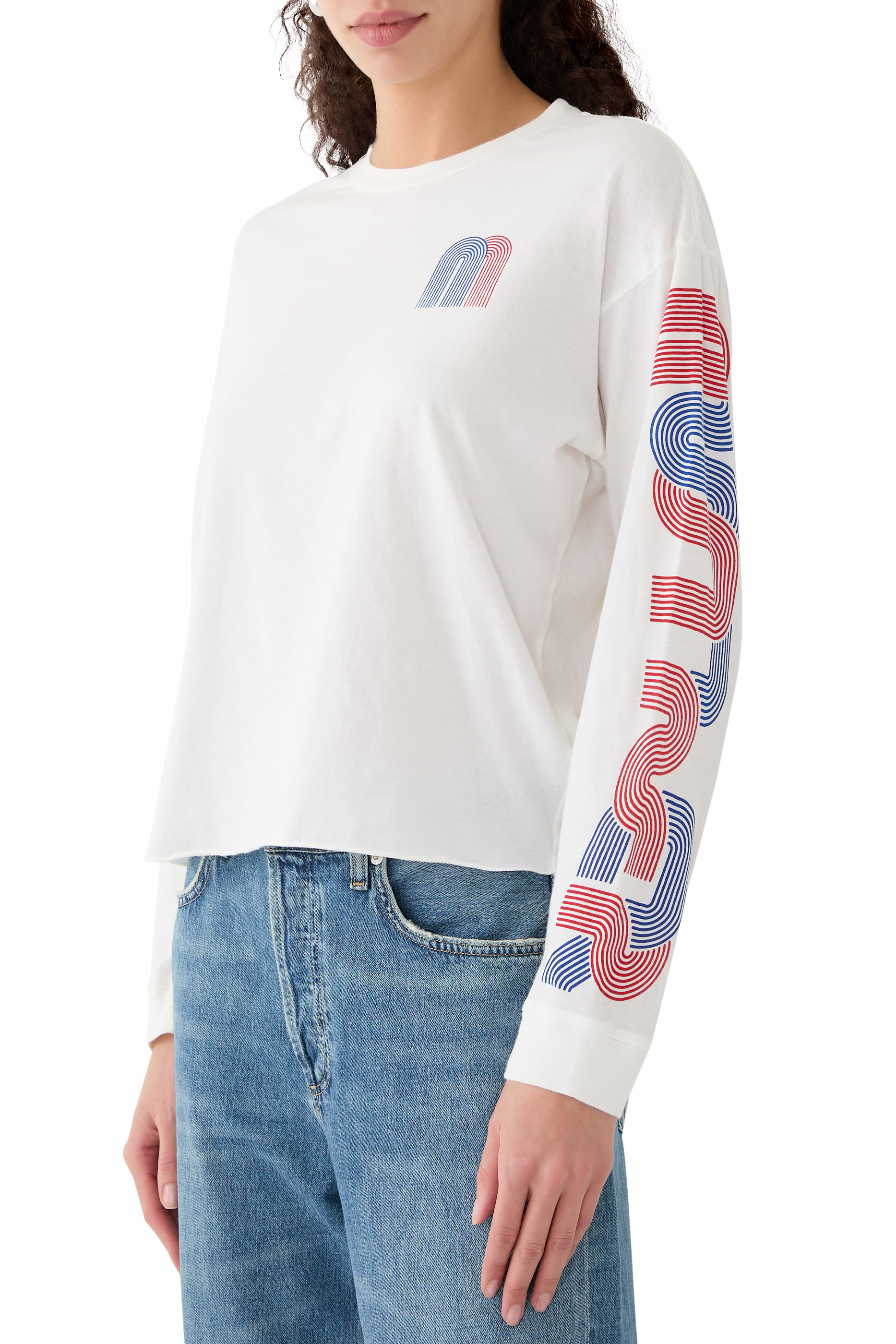 سويت شيرت بأكمام طويلة وقصة واسعة وحافة بدون حياكة