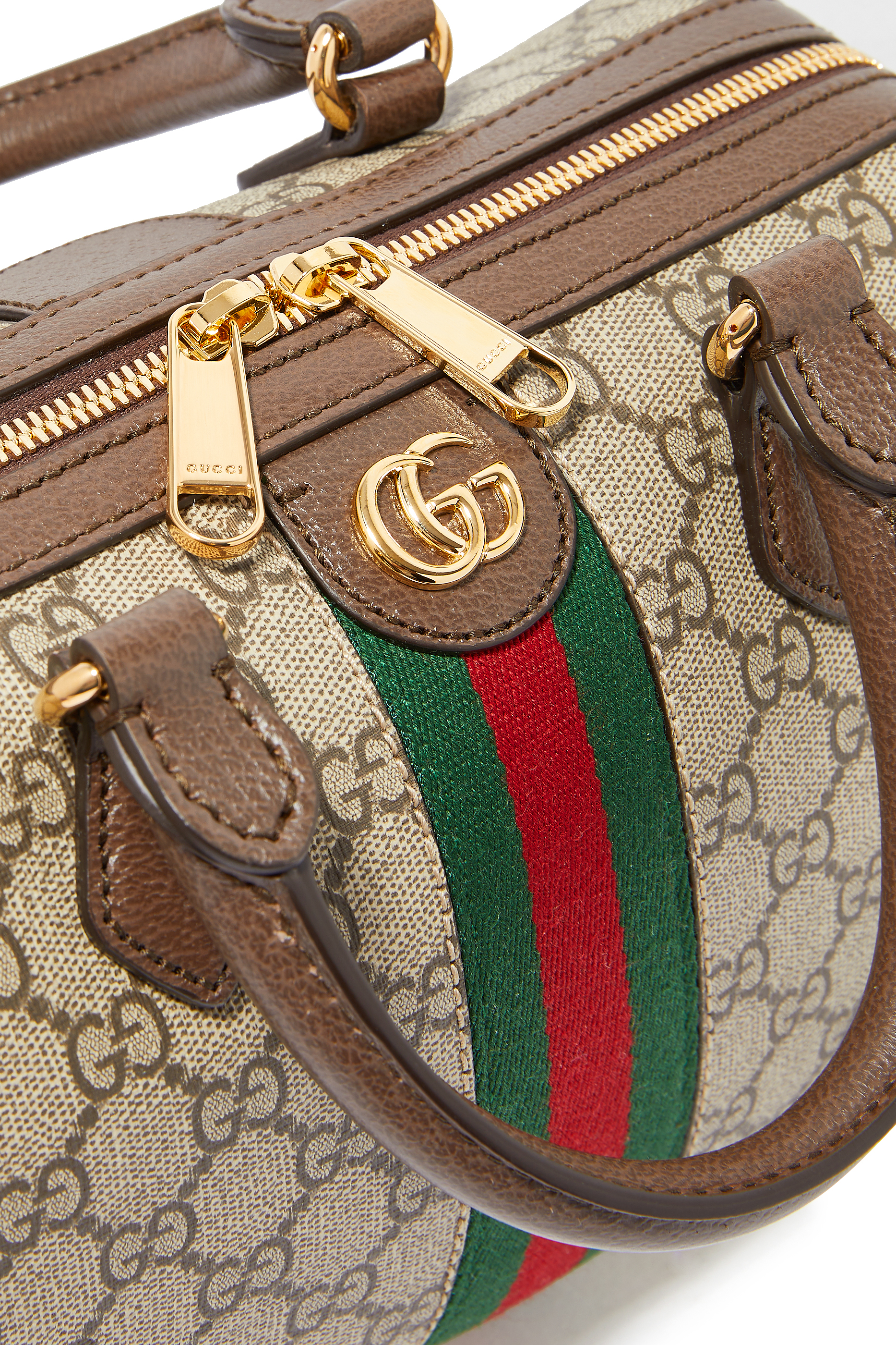 حقيبة أوفيديا بيد علوية ونقشة حرفي شعار الماركة