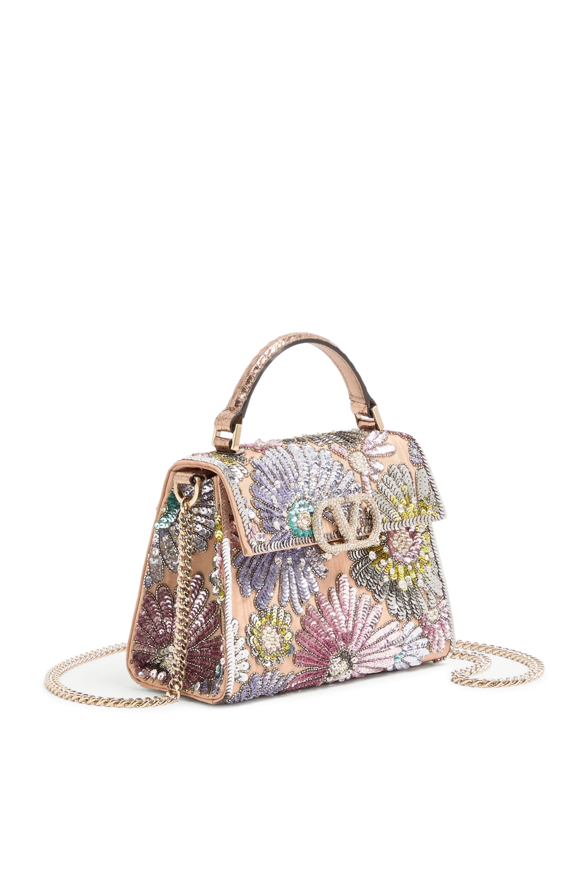 حقيبة بيد علوية وحمالة سلسلة