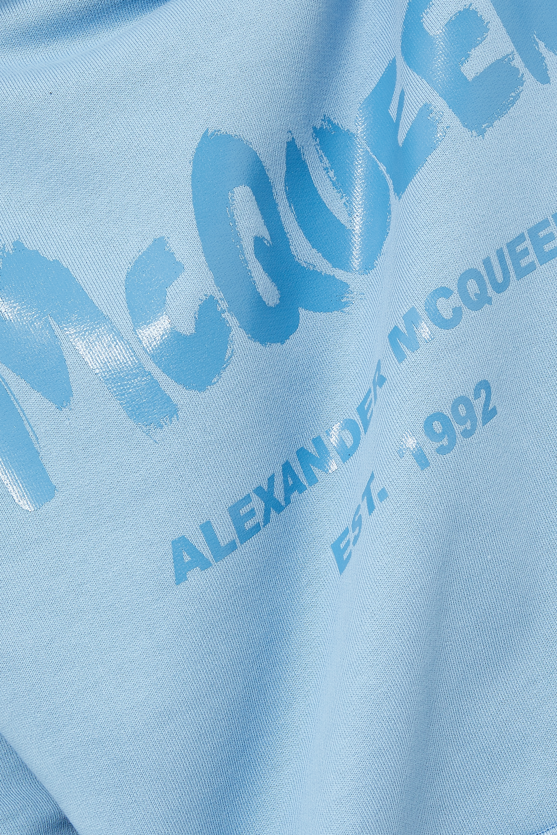 سويت شيرت بغطاء رأس وطبعة جرافيتي