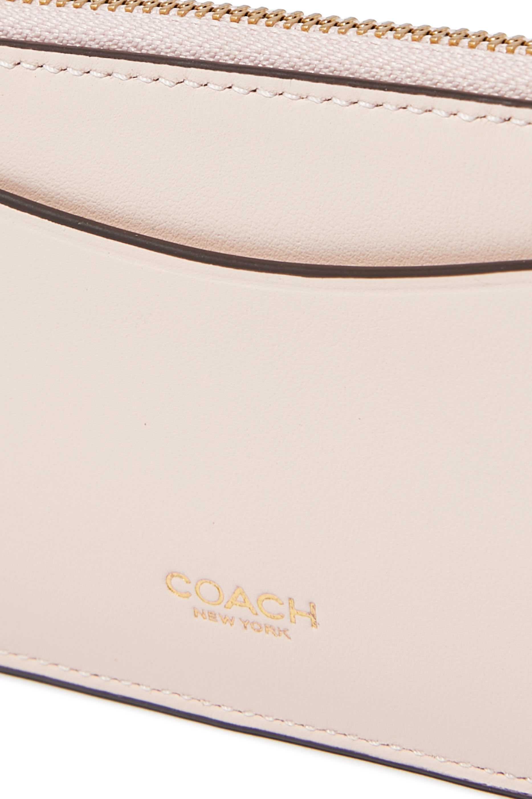 محفظة بسحاب محيط جلد