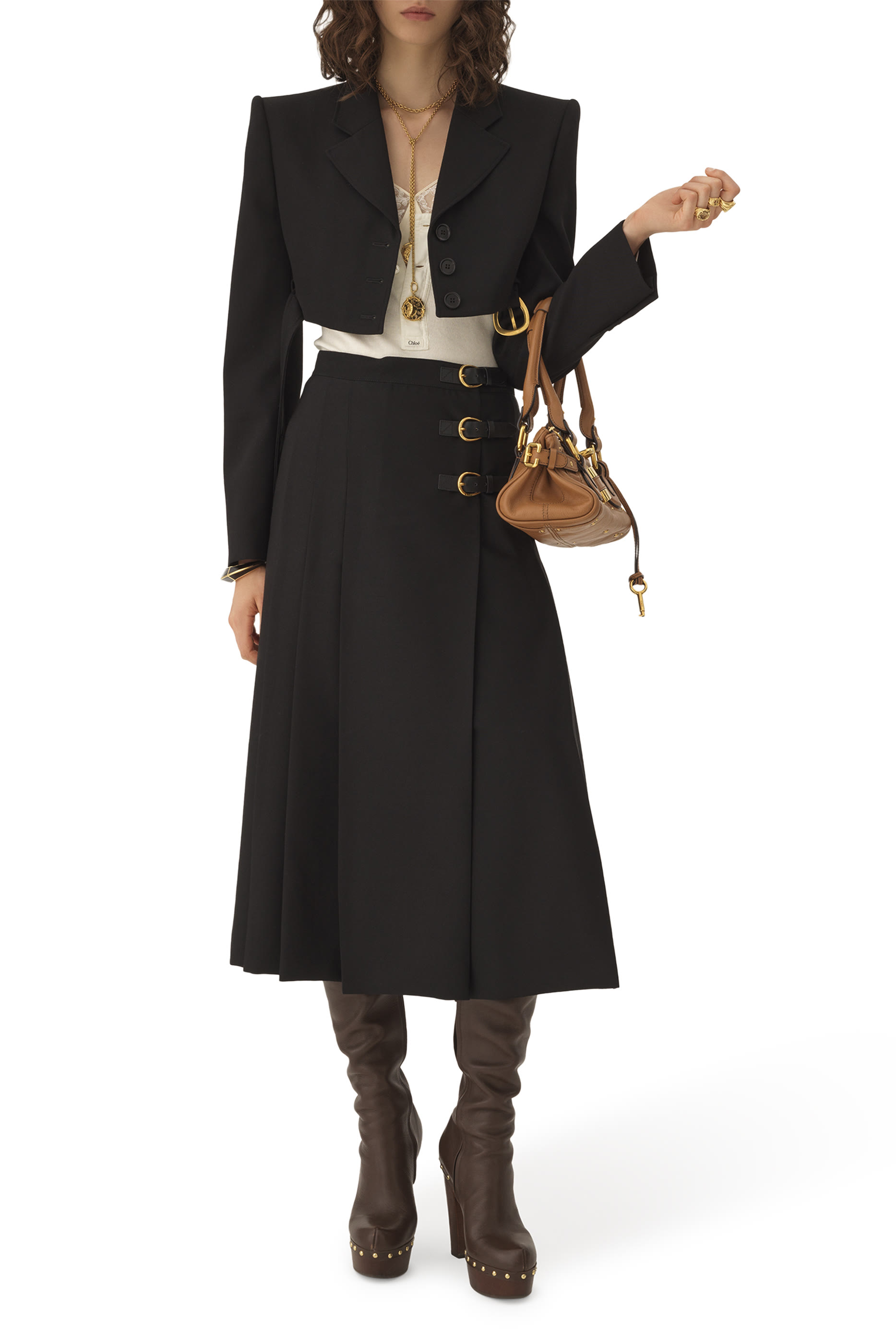 تنورة متوسطة الطول بطيات وأشرطة جلد بمشابك