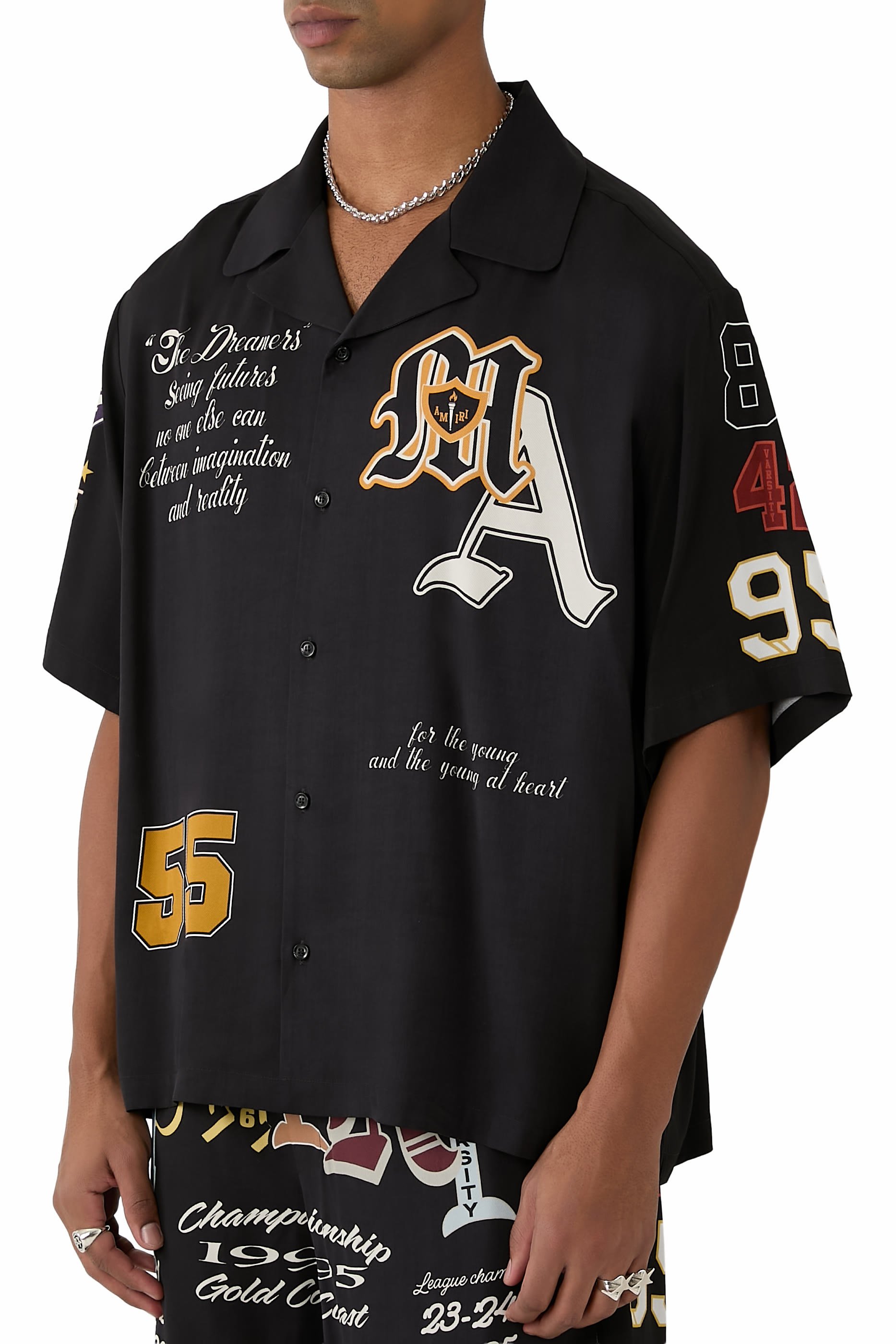 قميص بقصة فضفاضة بياقة مطوية ورقع بتصميم جامعي