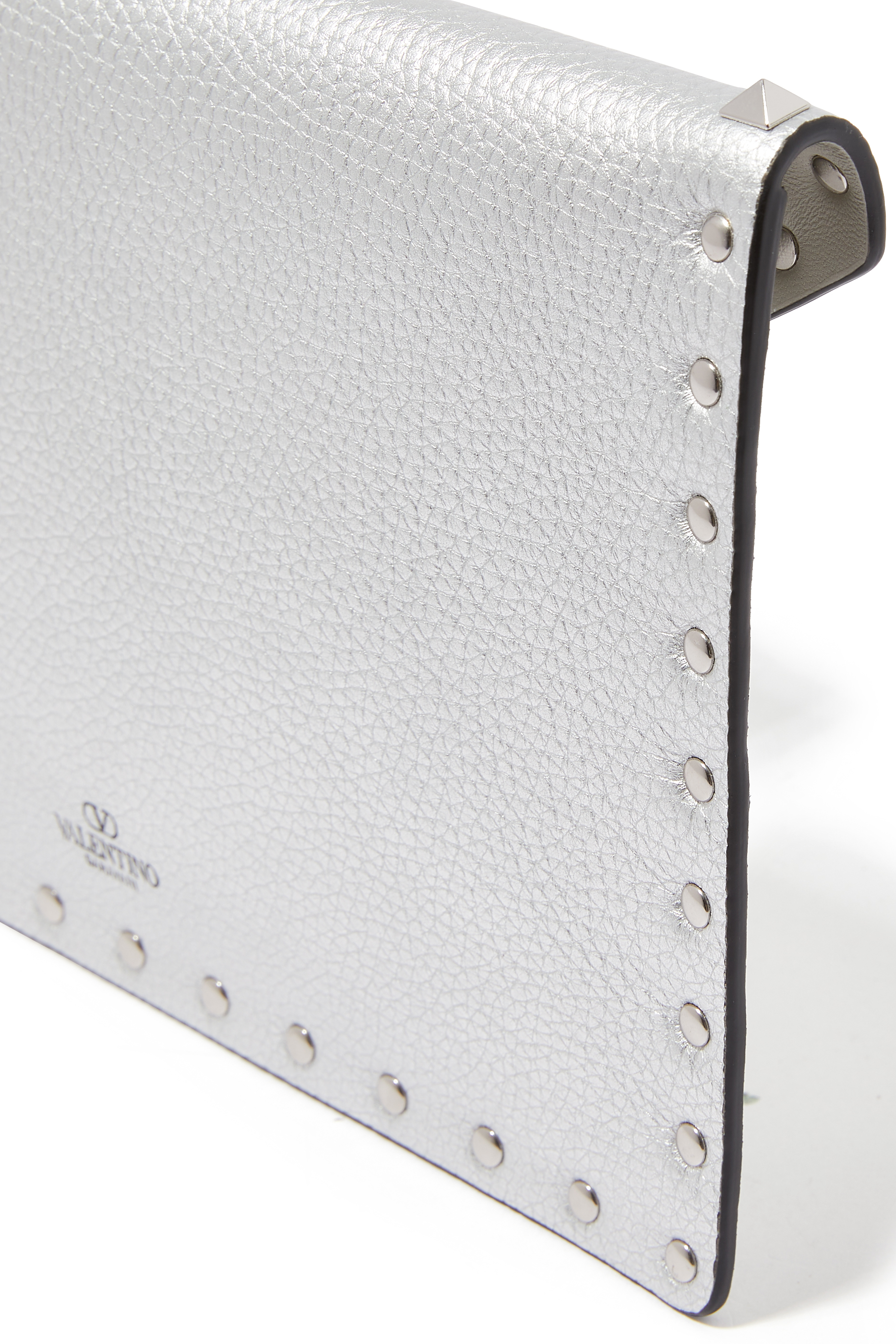 حقيبة صغيرة بحلي هرمية جلد