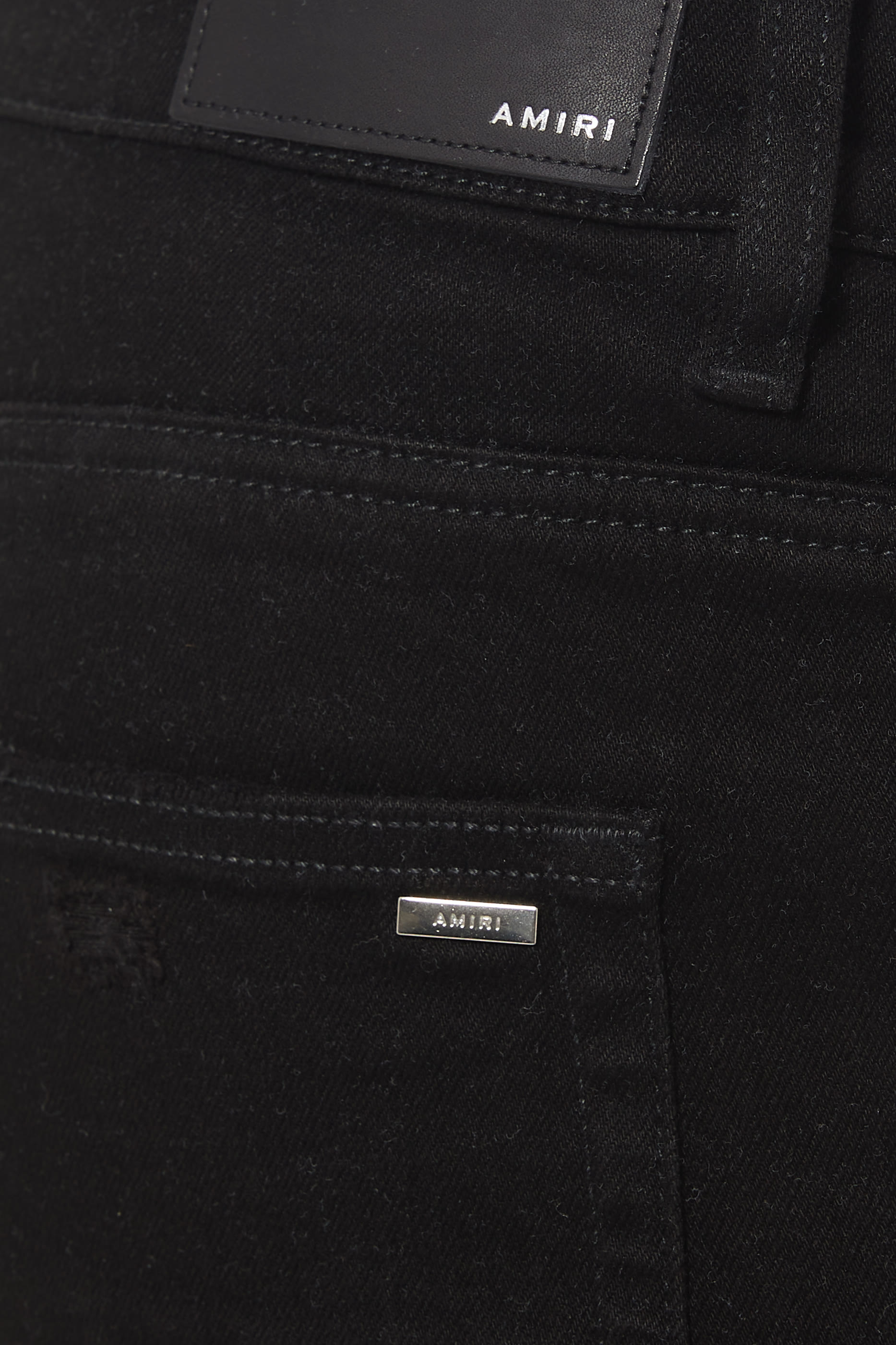 بنطال جينز إم إكس1 بتصميم ممزق