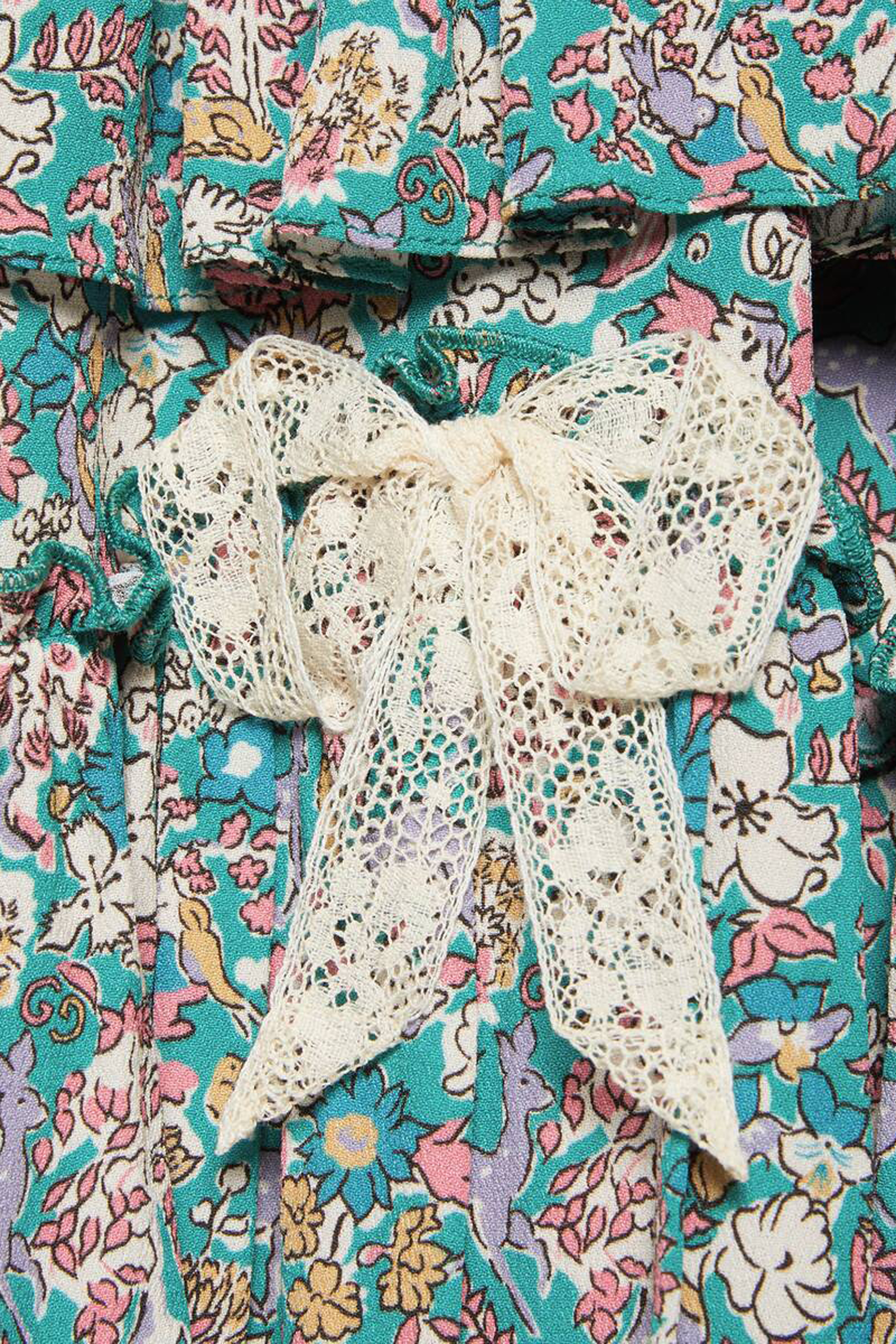 تنورة بنقشة زهور وشعار Gucci Liberty