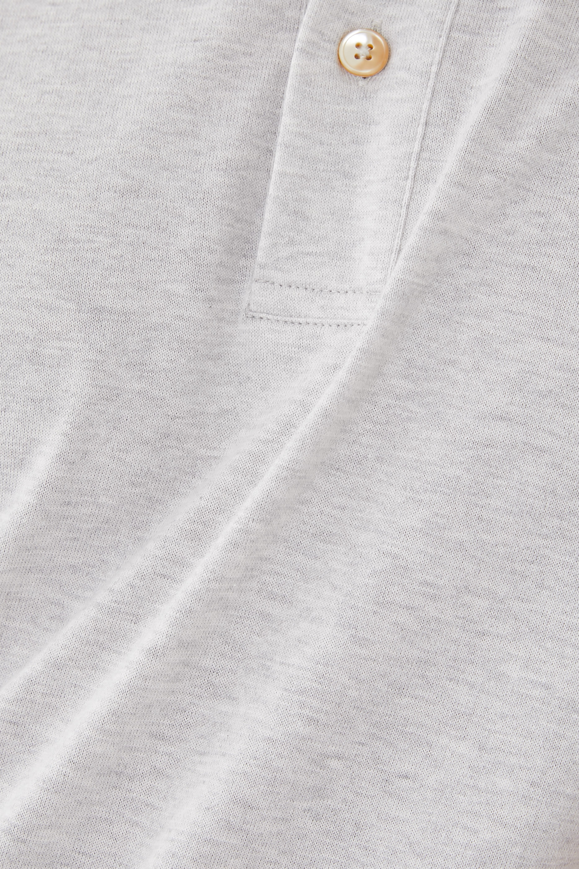 قميص بولو بقصة مدببة جرسيه