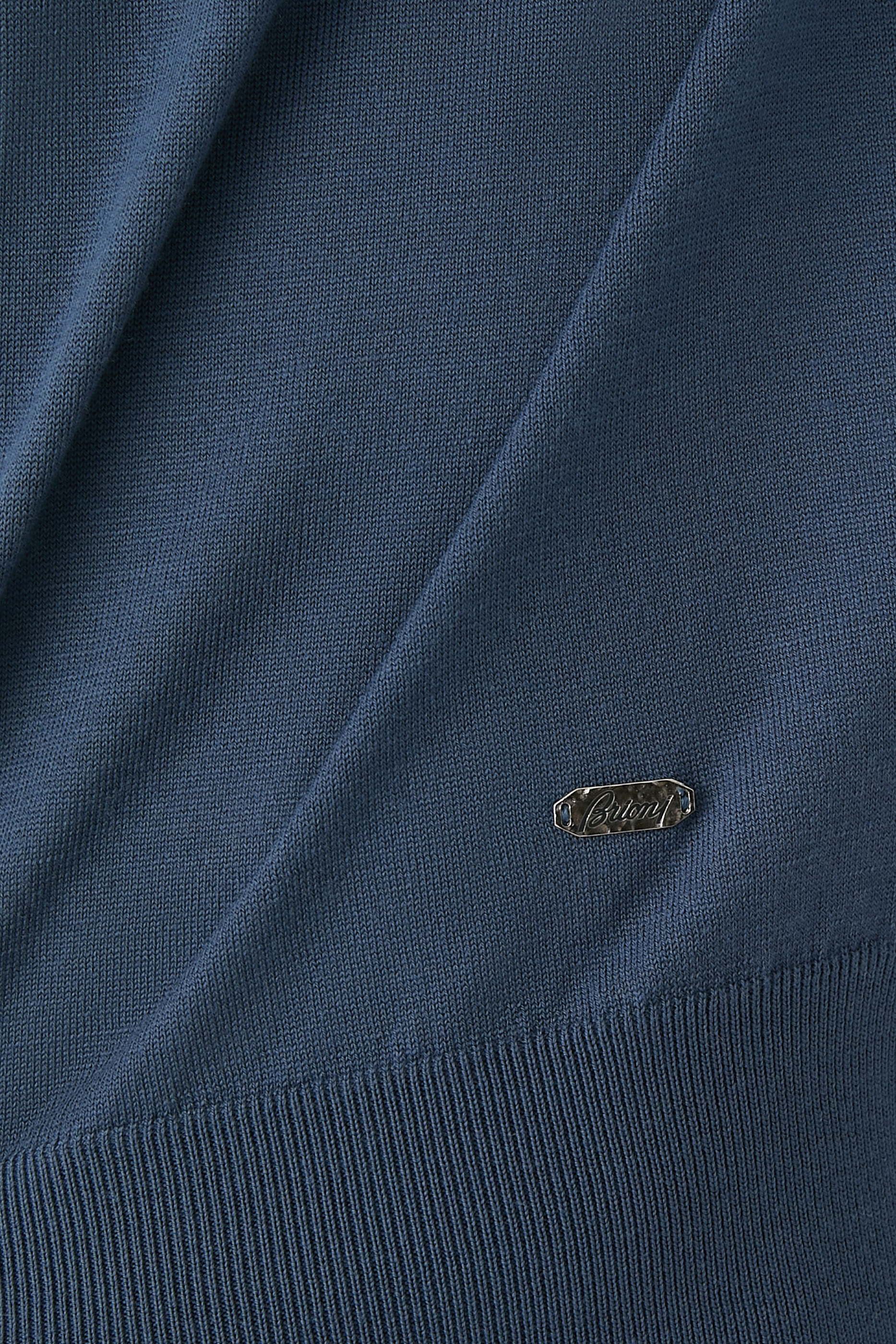 قميص بولو بأكمام طويلة وسحاب