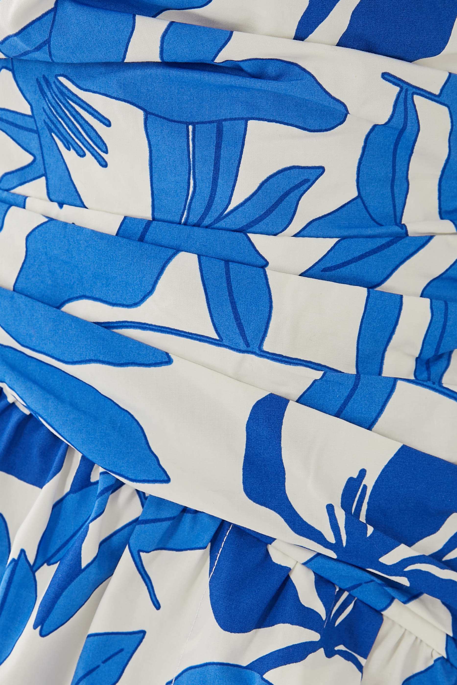 فستان أزرق طويل بفتحة وتصميم غير متماثل