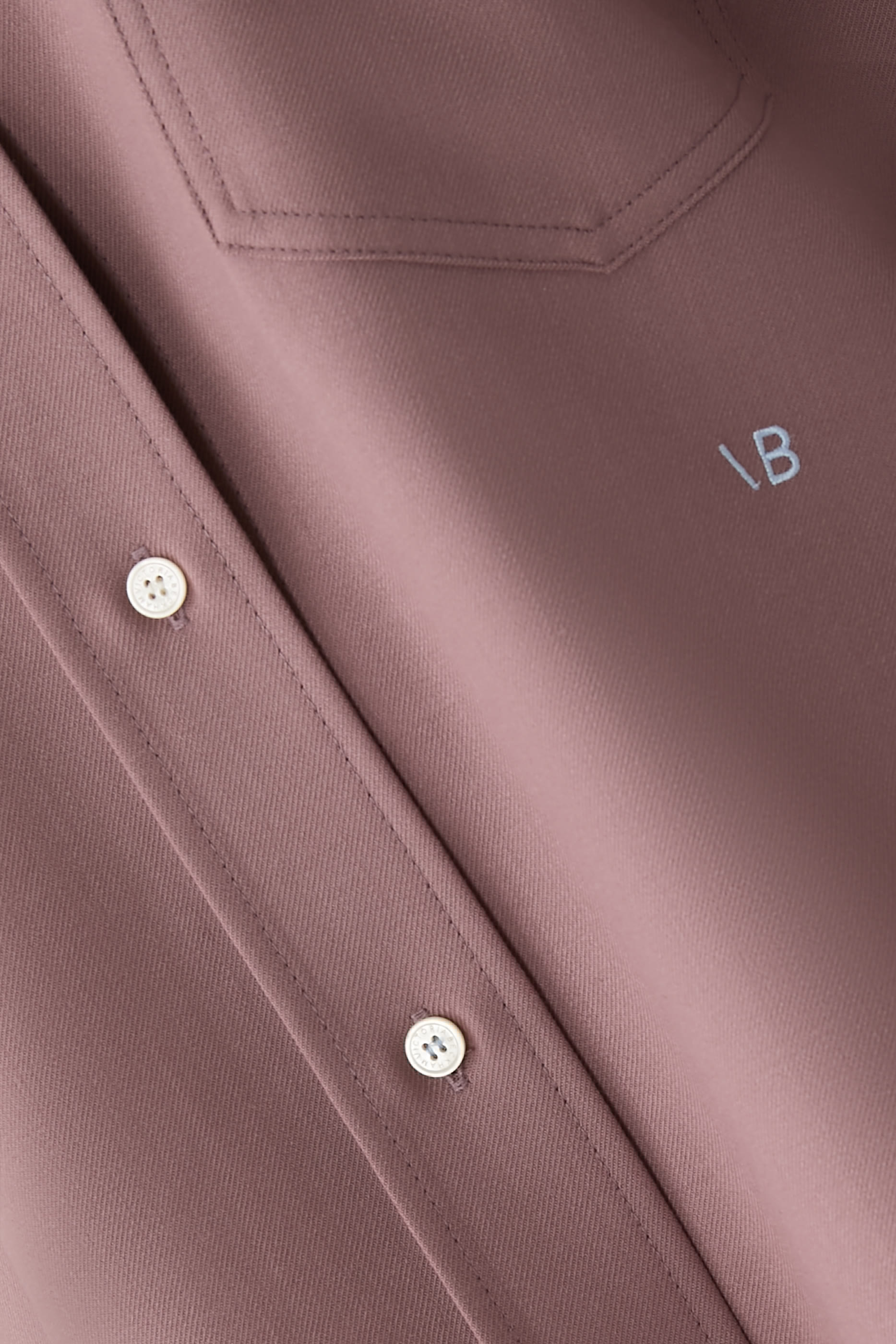 قميص قصير بأكمام طويلة