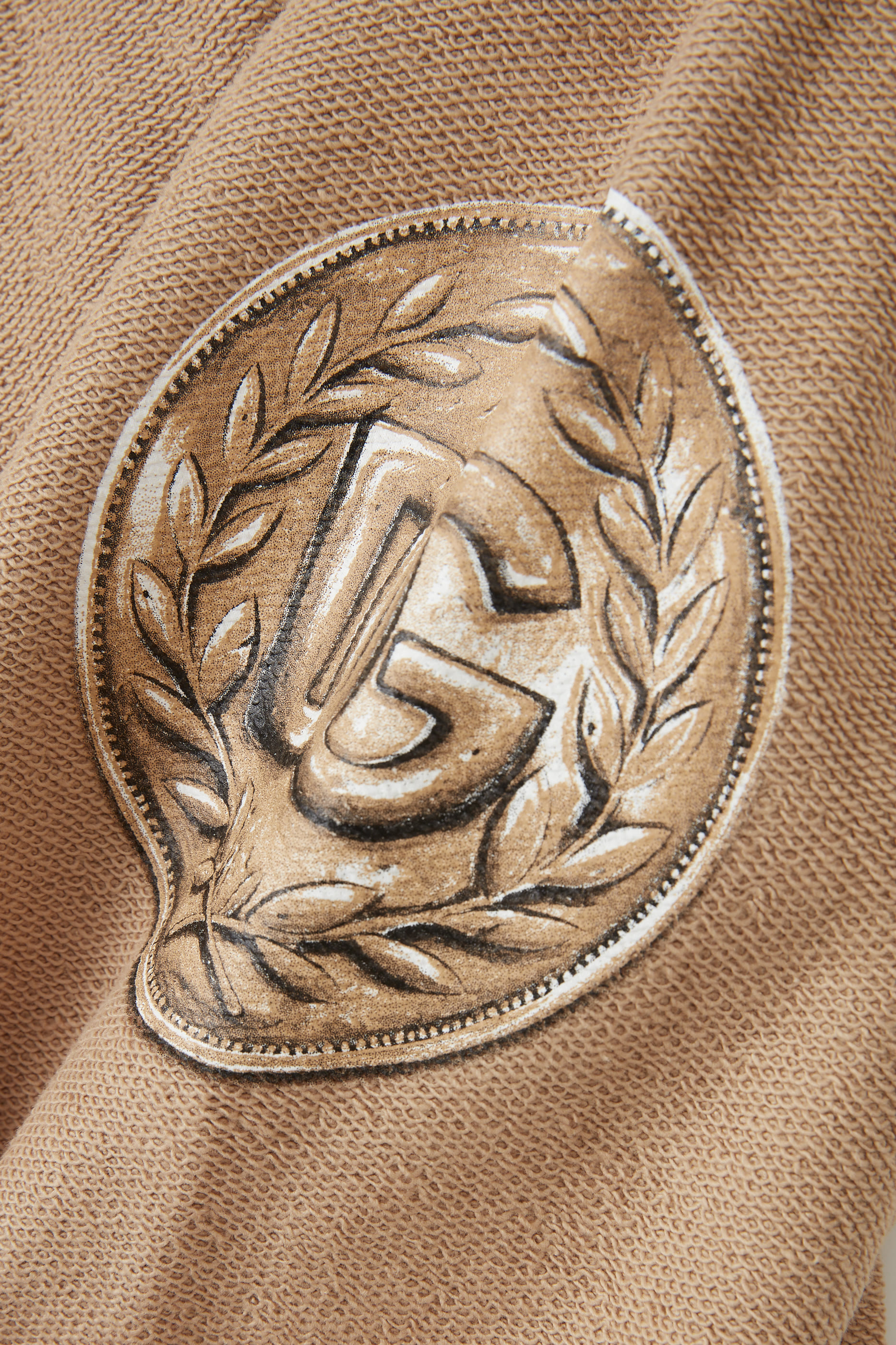 بنطال رياضي قطن بشعار الماركة بتصميم عملة للأطفال