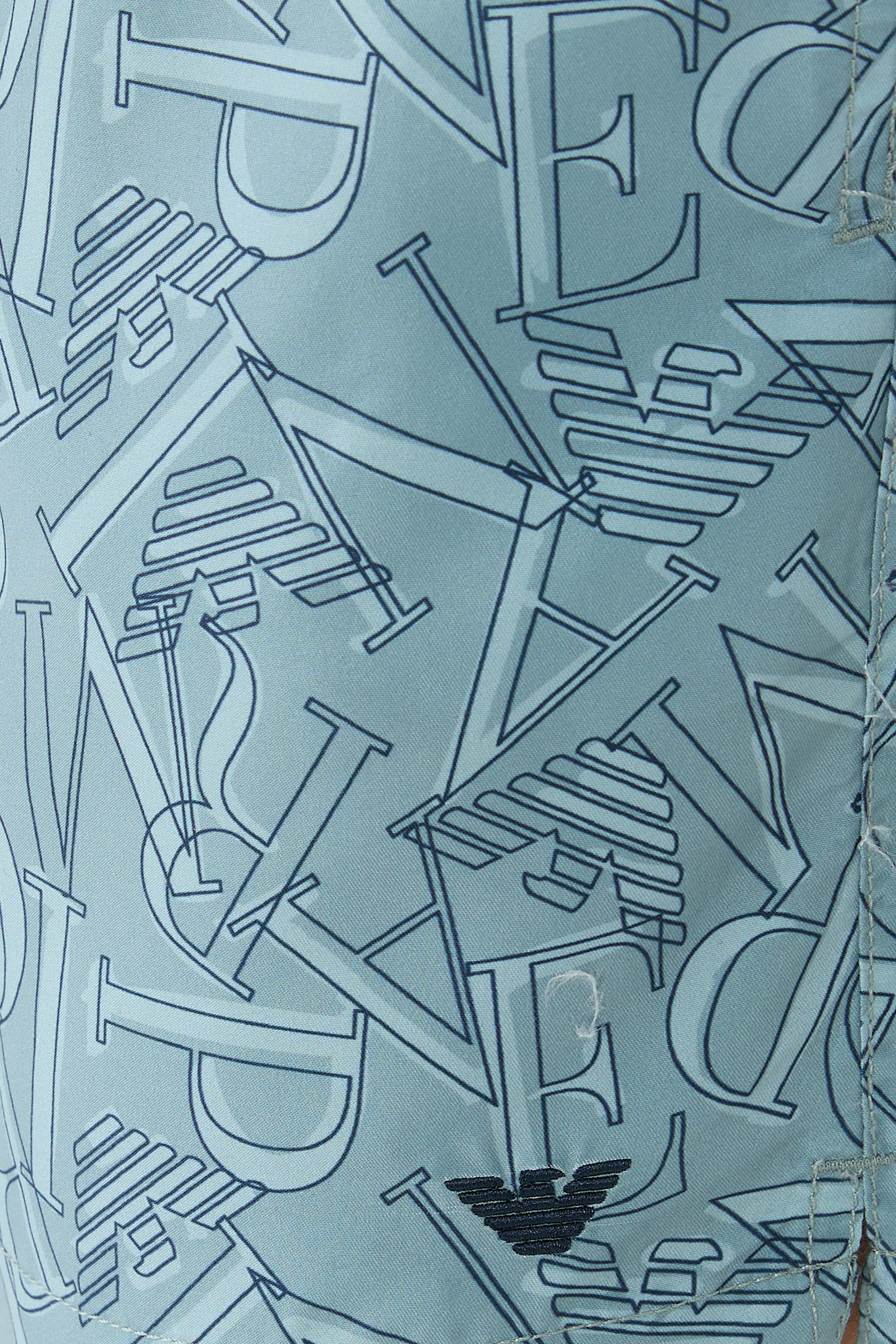 شورت سباحة بشعار الماركة