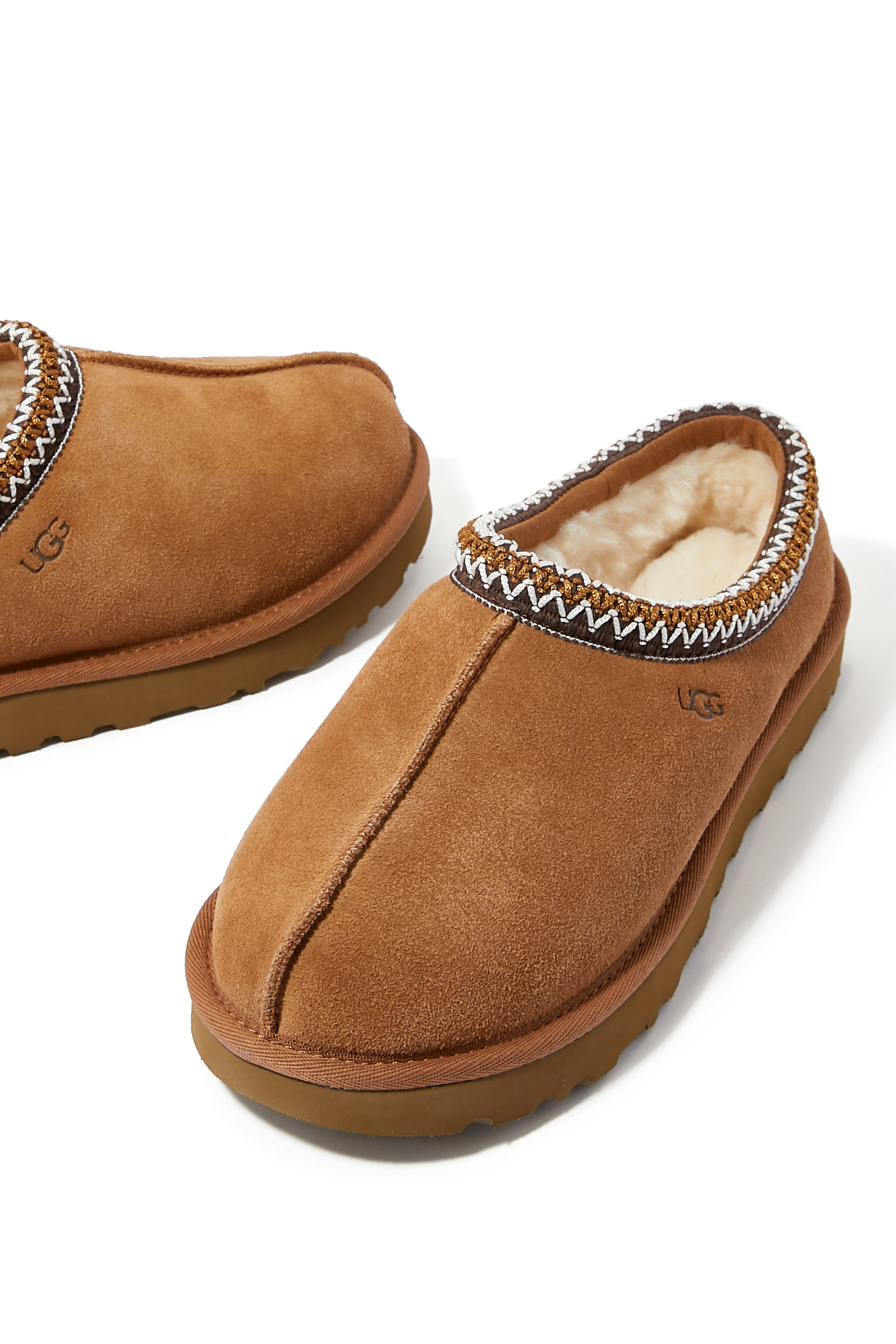 حذاء تسمان مفتوح من الخلف