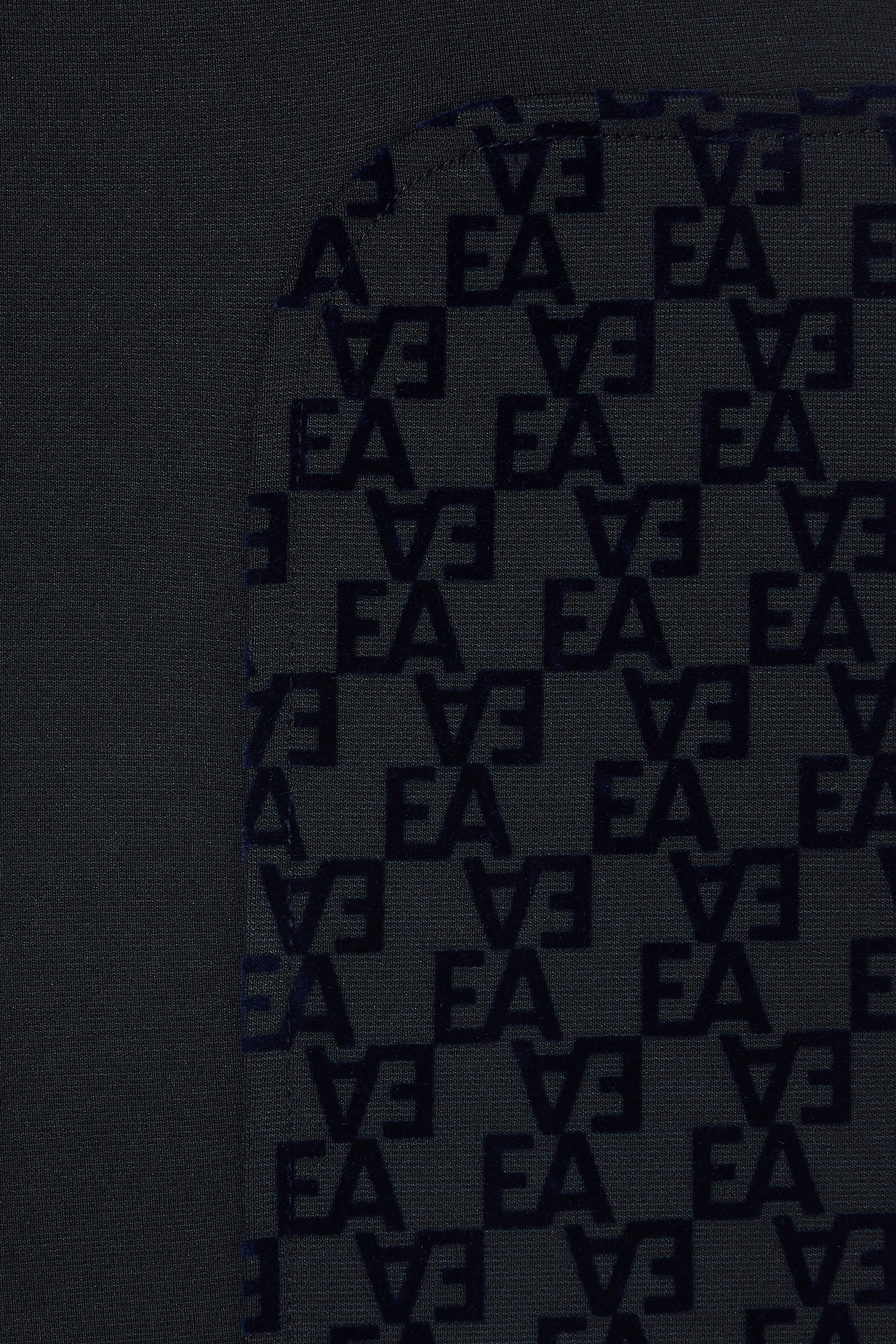 بنطال رياضي بقصة واسعة وشعار الماركة بملمس بارز جيرسيه متشابك