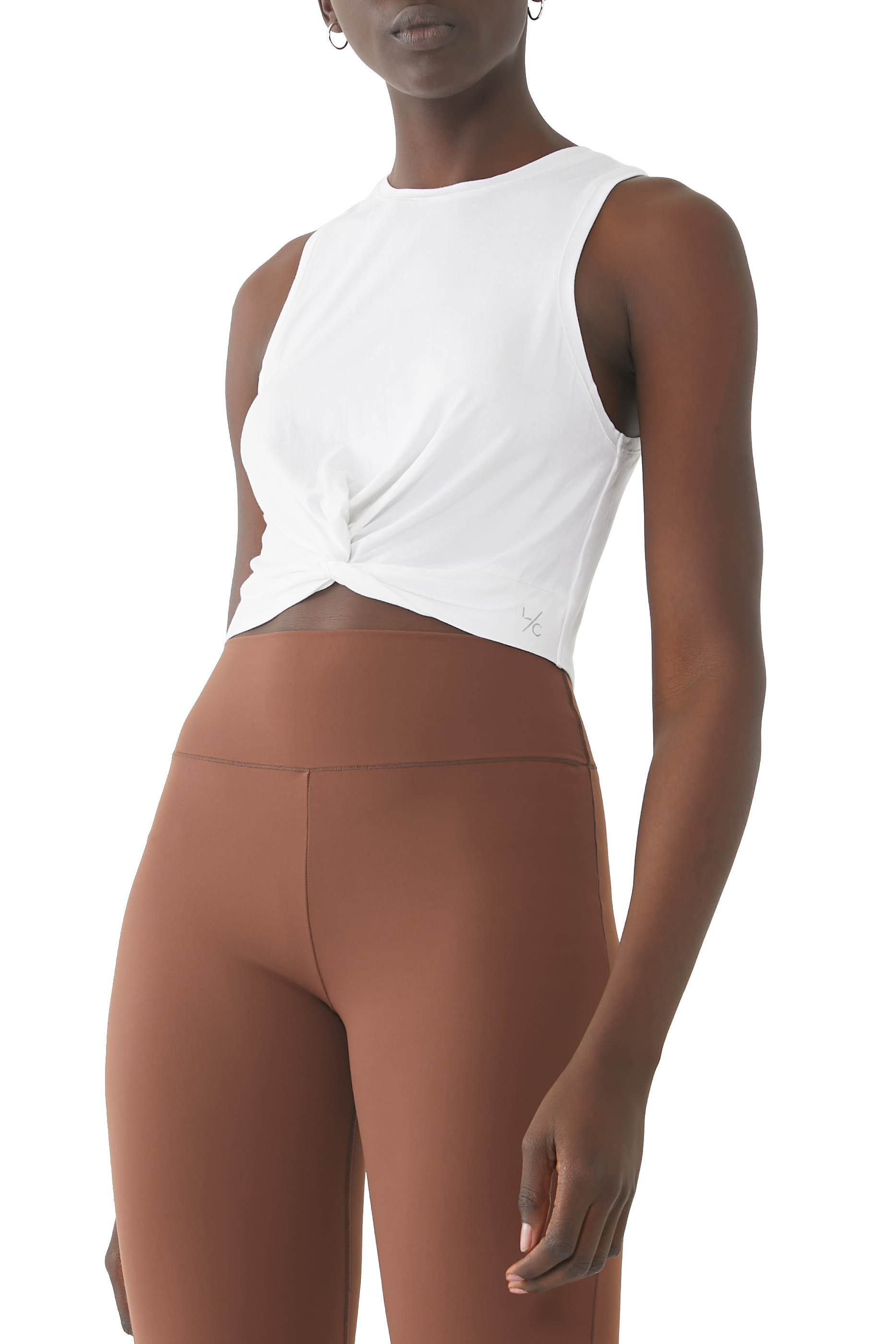 بلوزة الفايت بلا أكمام بعقدة للبيت