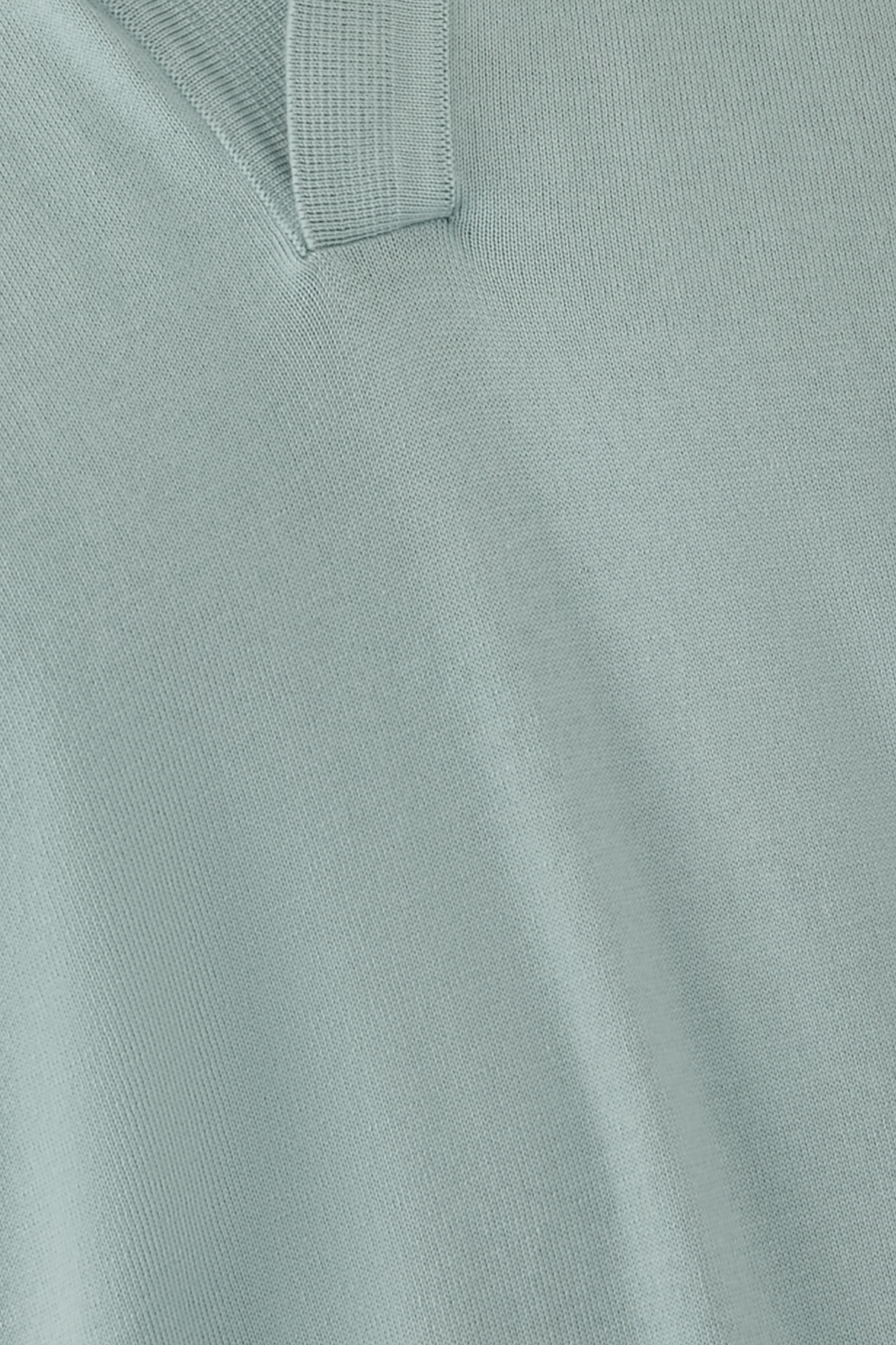 قميص بولو بلا أزرار بأكمام قصيرة