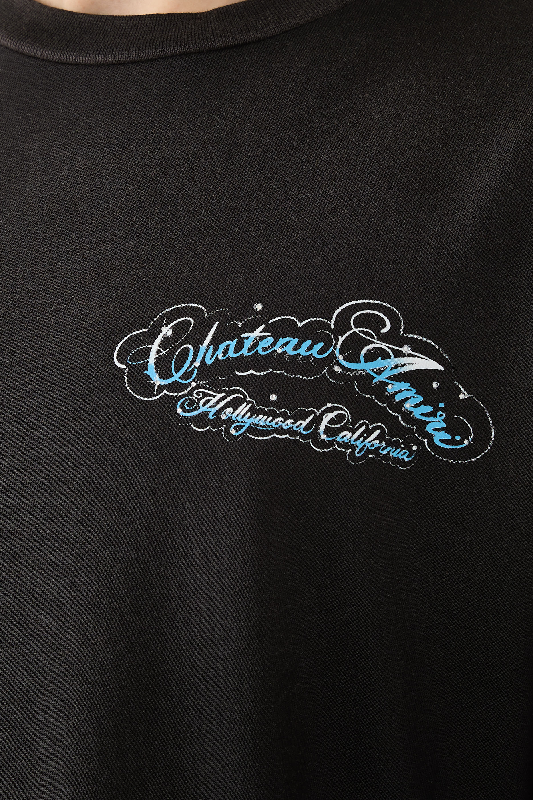 تيشيرت بقصة فضفاضة ونقشة شعار الماركة بكريستال