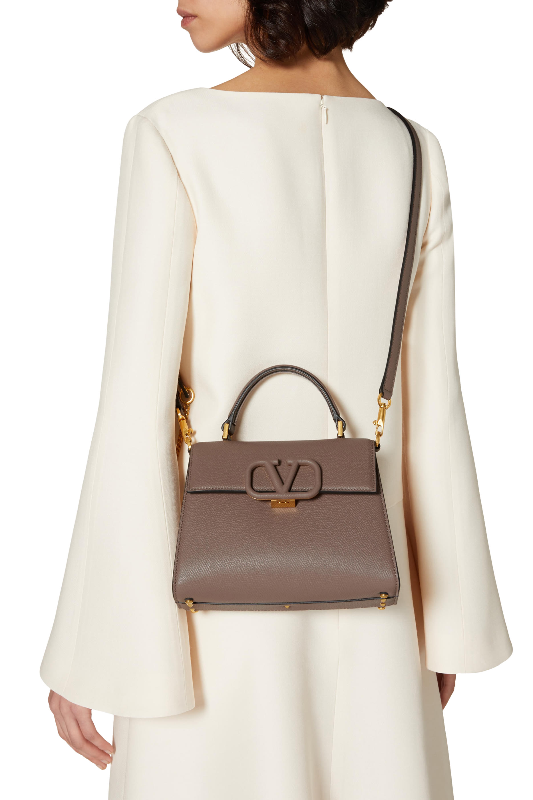 حقيبة يد بشعار الماركة