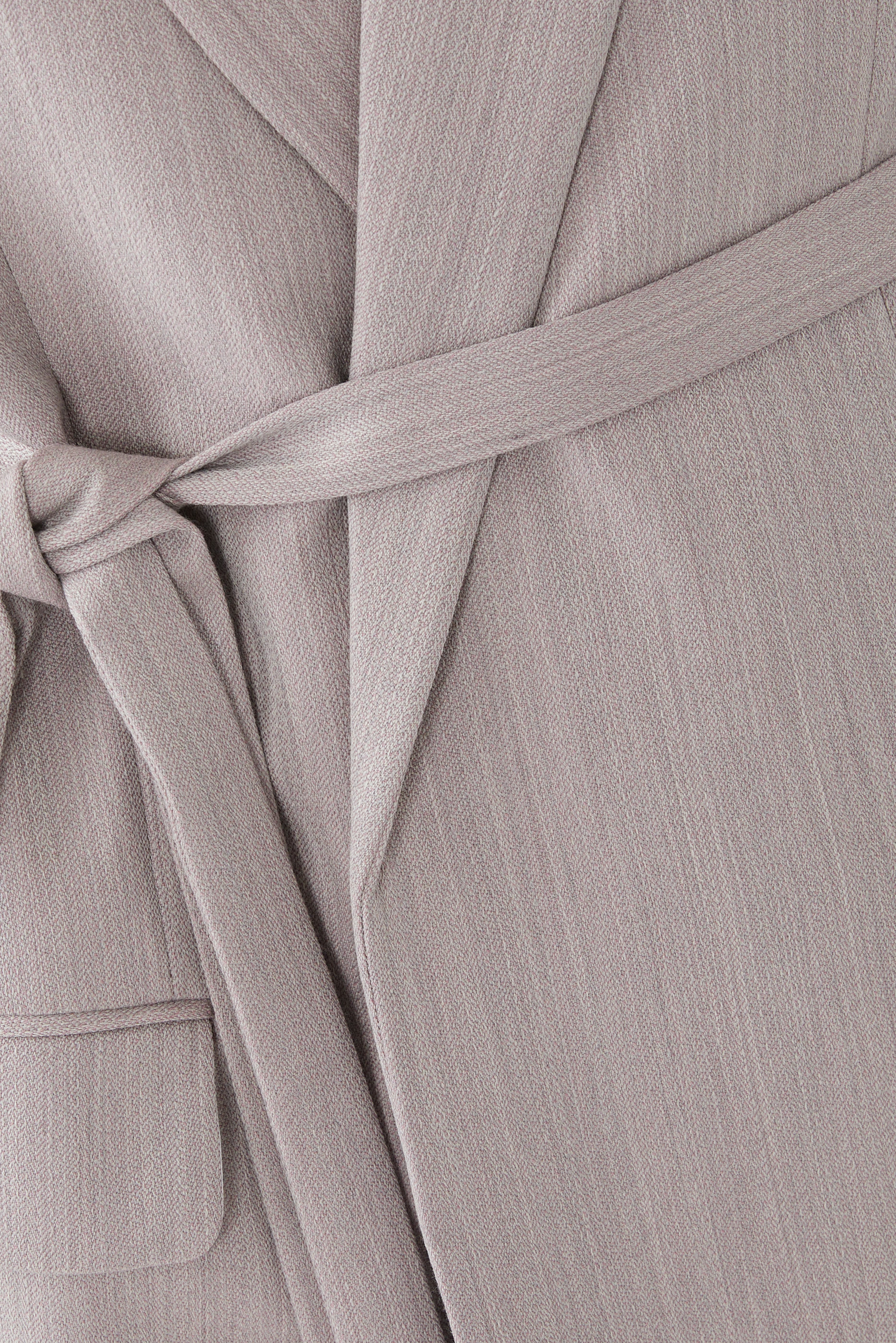 جاكيت بحزام