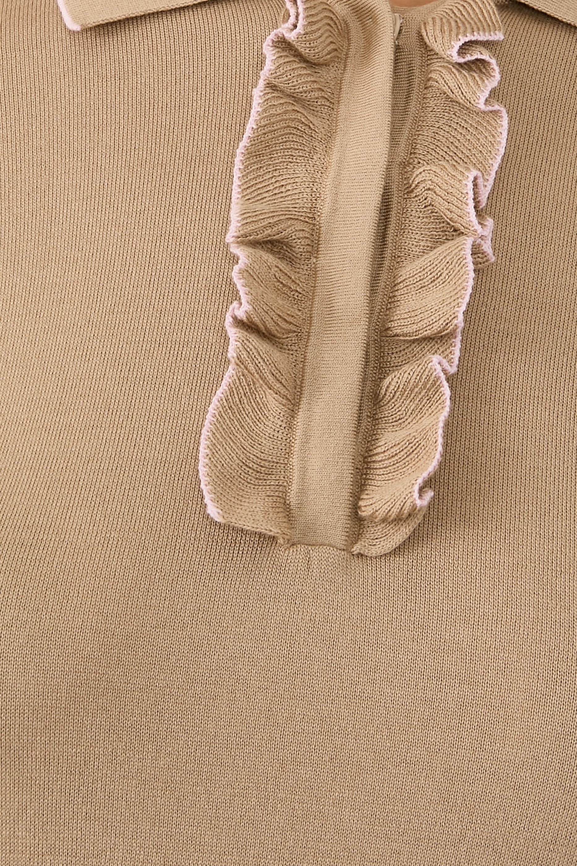 بلوزة بولو منسوجة مزينة بكشكش