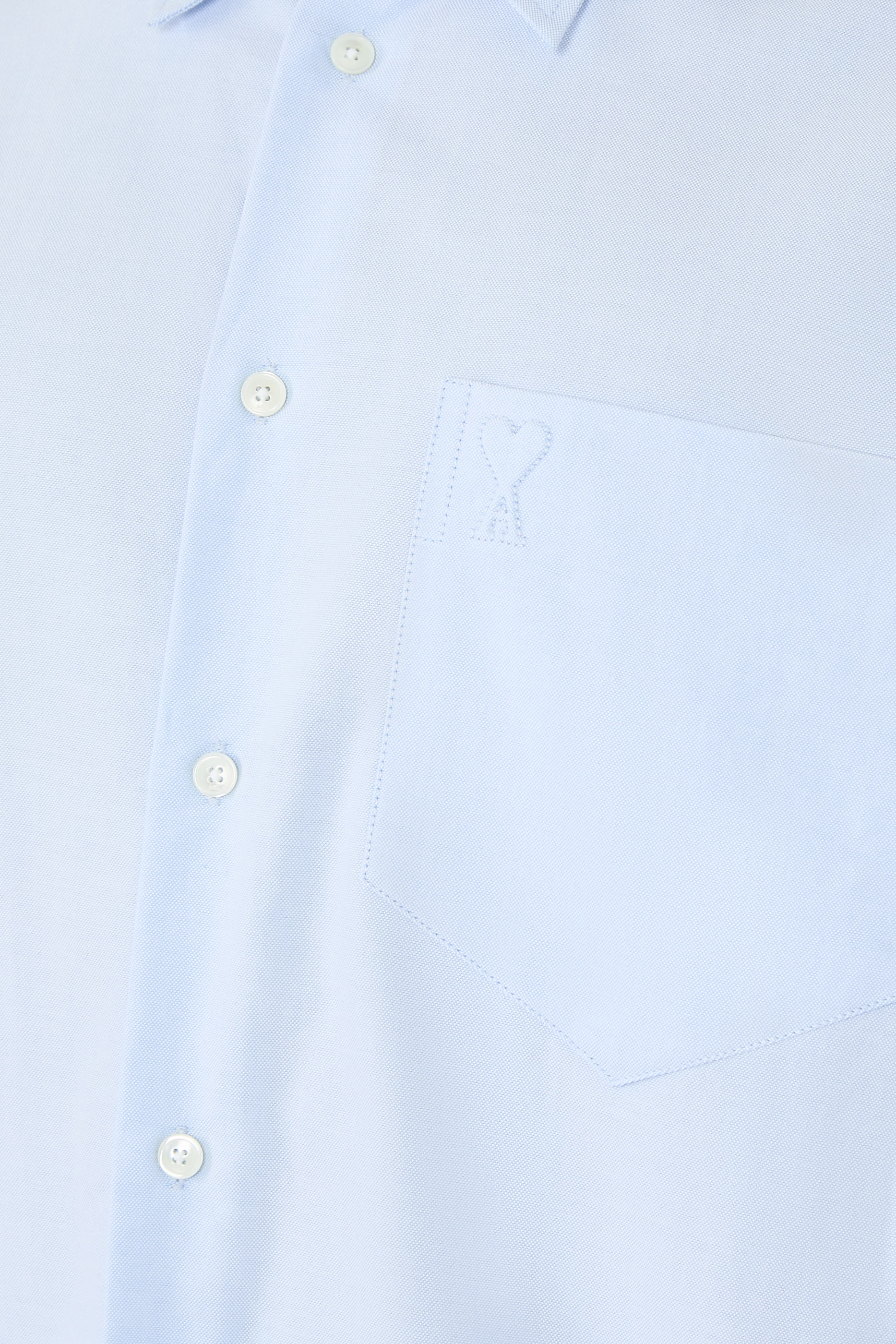 قميص بقصة مربعة