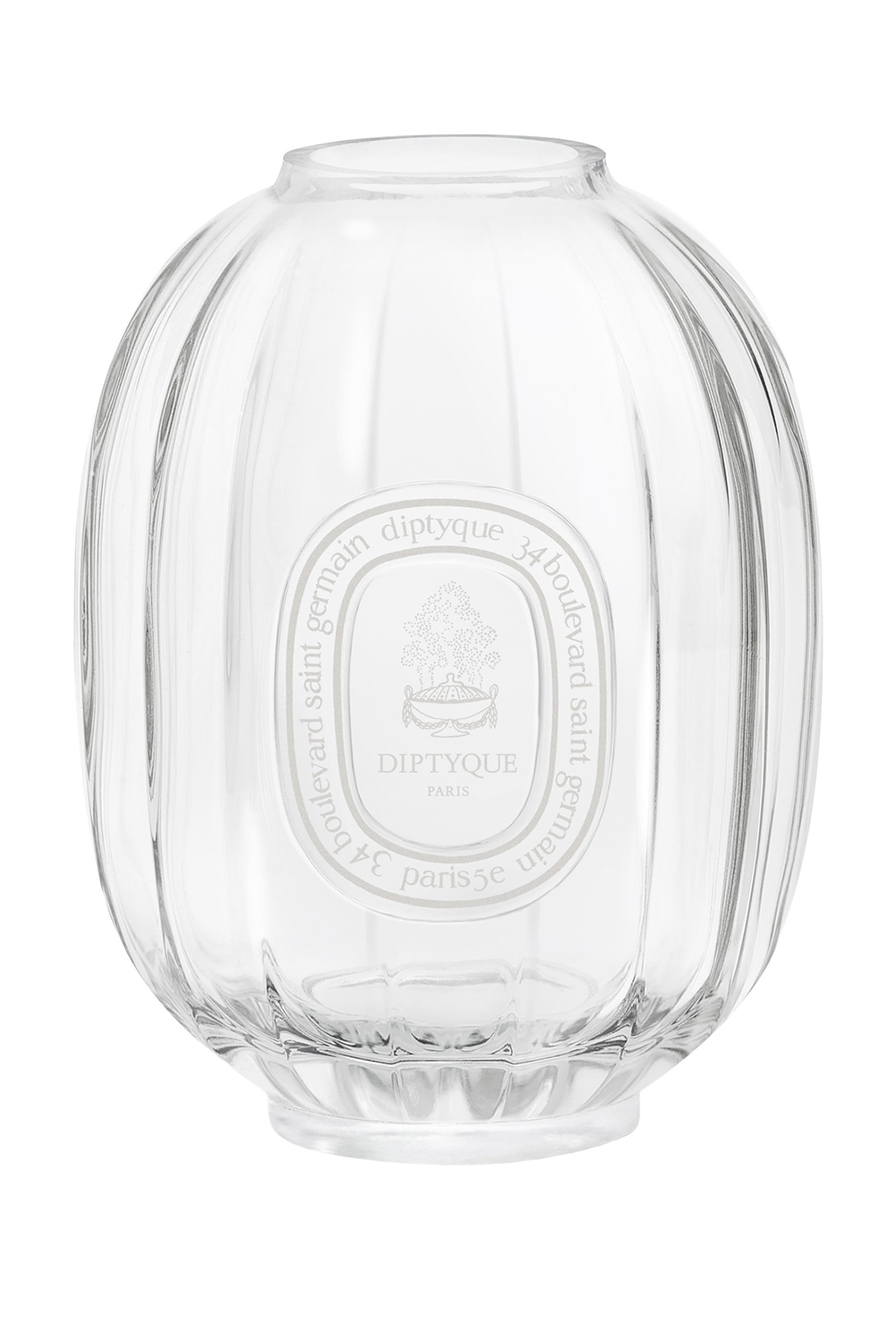 وعاء زجاجي صغير لأعواد توزيع العطر