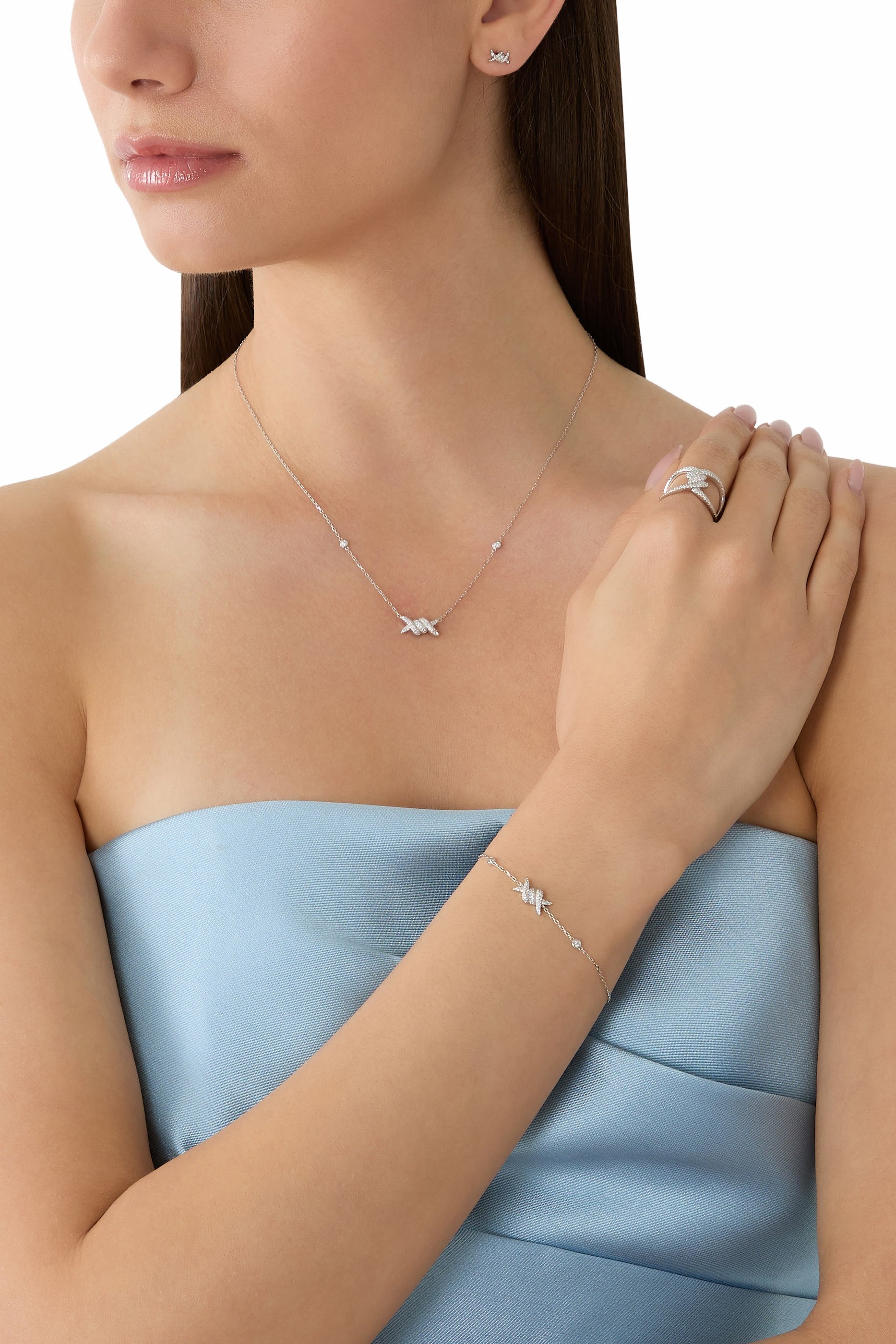 خاتم باربيليه بتصميم ملفوف مرصع بالماس، ذهب أبيض عيار 18