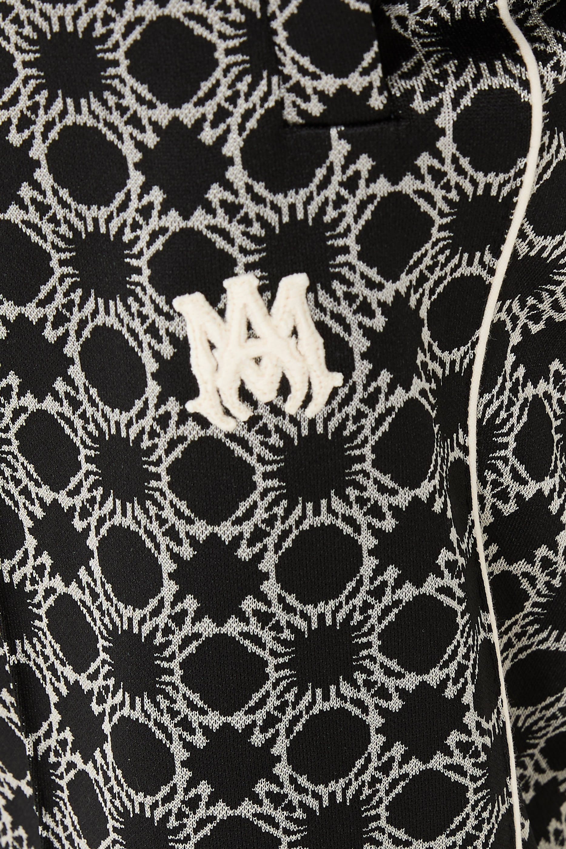 بنطال رياضي كواد بحافة واسعة وحرفي شعار الماركة