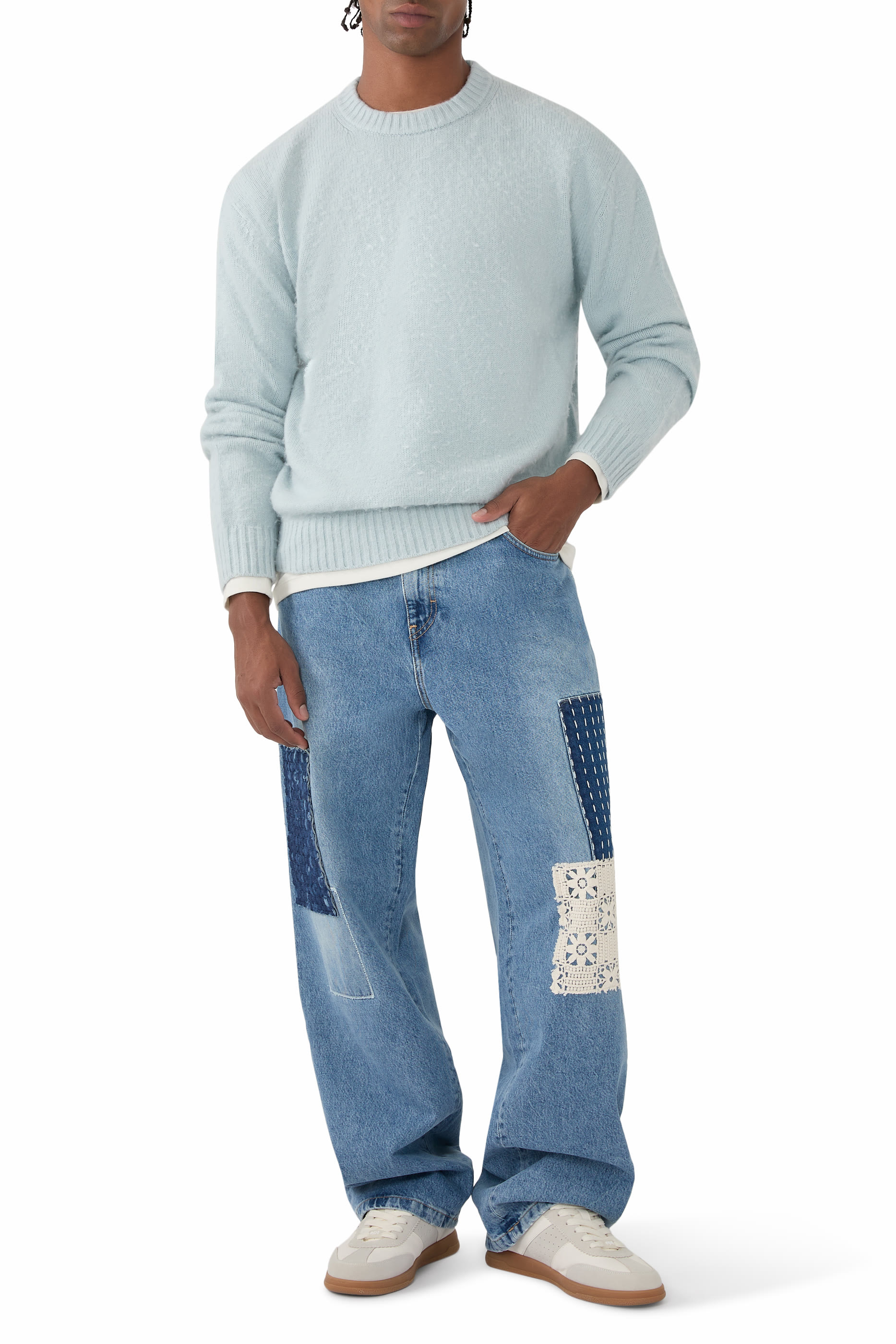 كنزة برقعة شعار الماركة